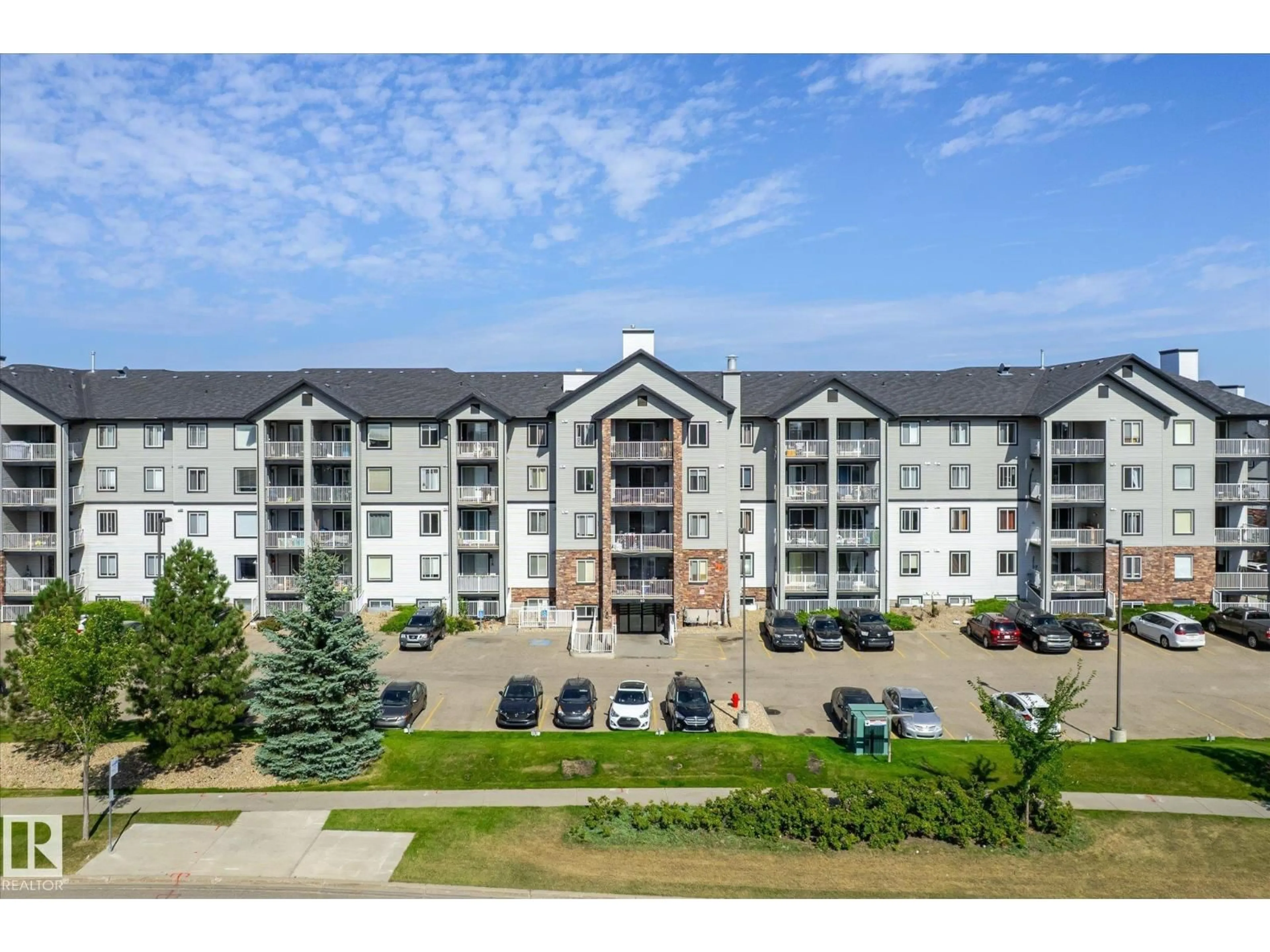 A pic from outside/outdoor area/front of a property/back of a property/a pic from drone, building for #111 - 111 SUMMERWOOD BV, Sherwood Park Alberta T8H0C3