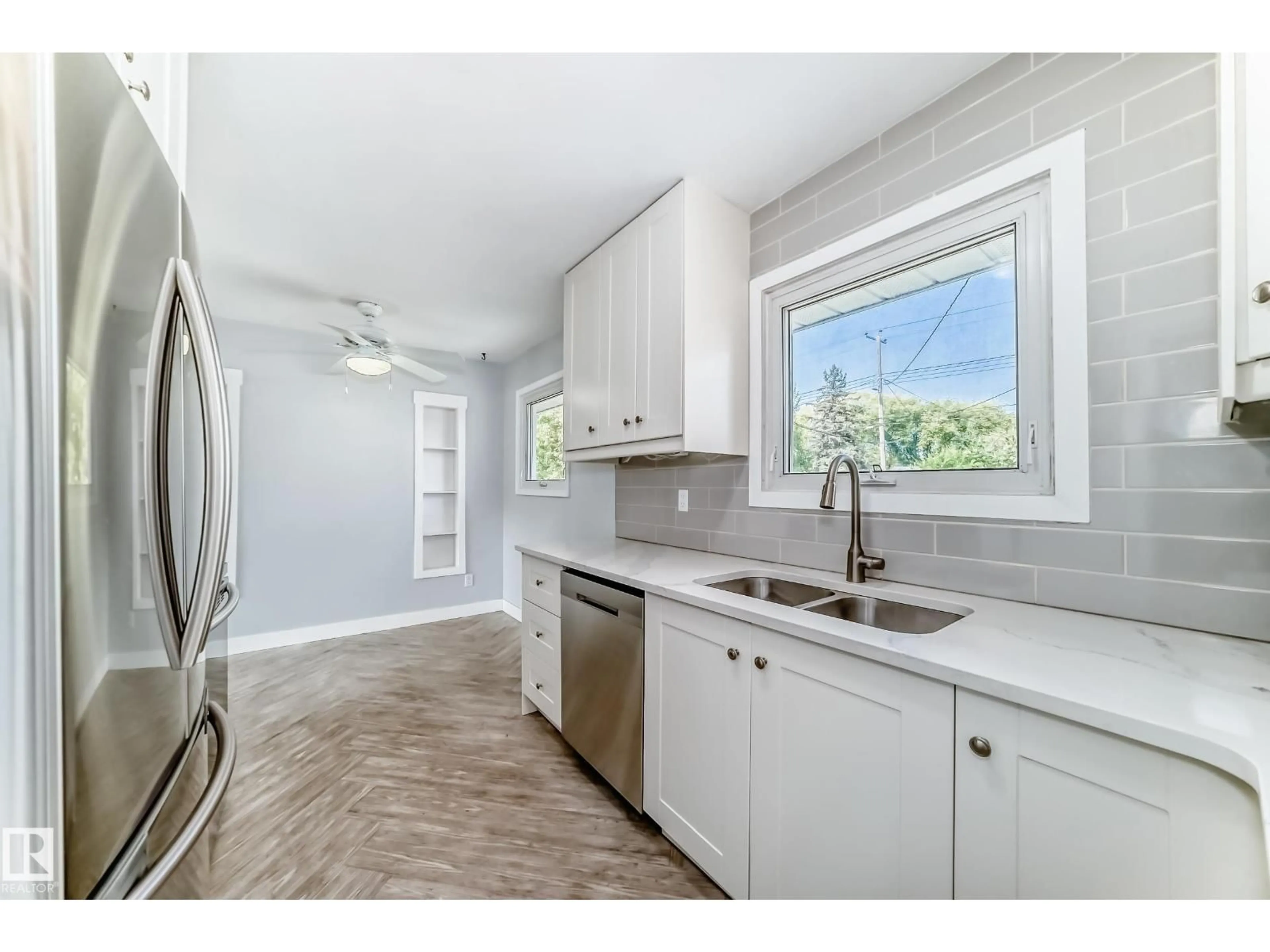 Open concept kitchen, ceramic/tile floor for 4038 113 AV, Edmonton Alberta T5W0R3