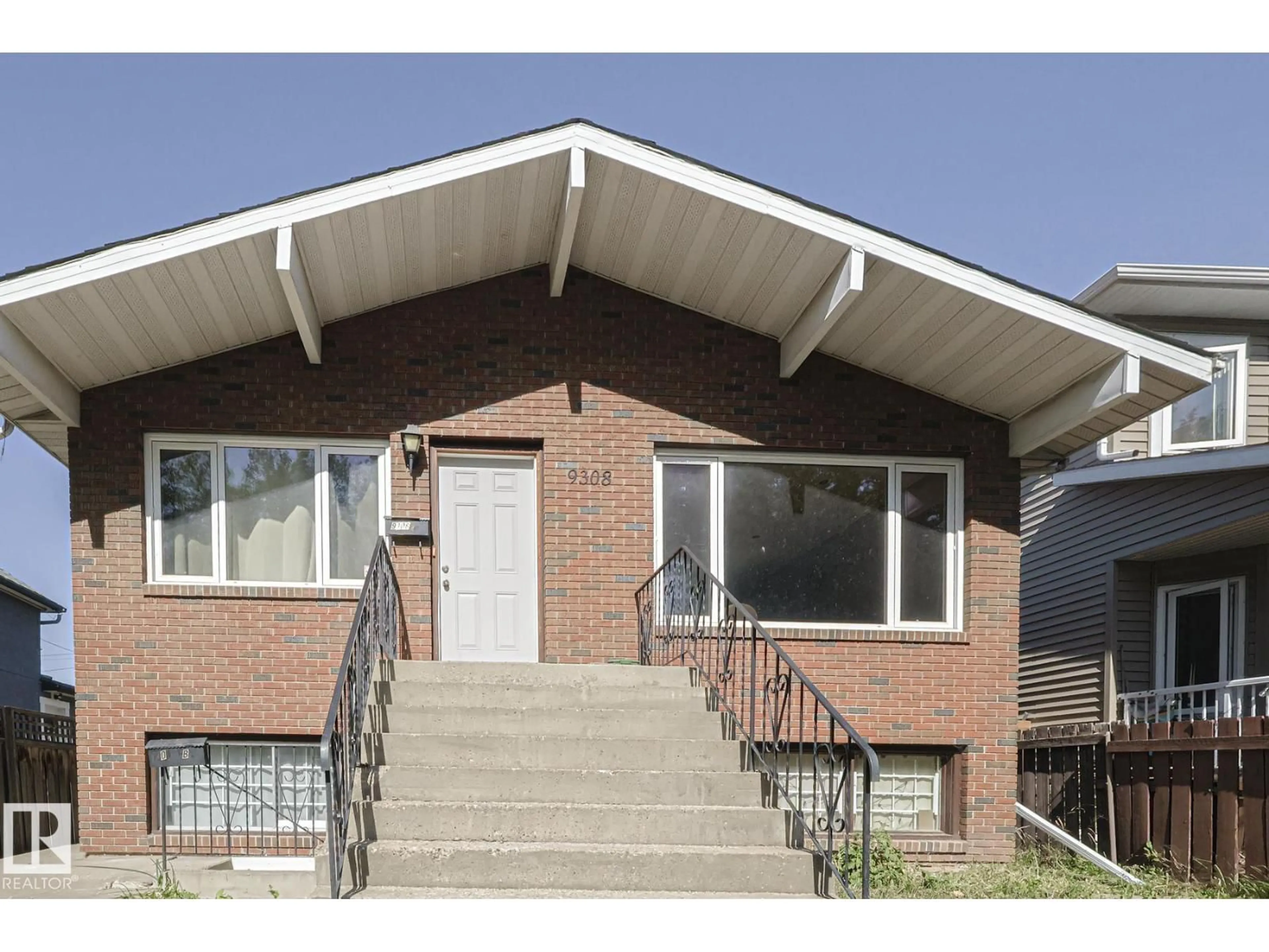 Home with brick exterior material, unknown for 9308A & 9308B 109A AV, Edmonton Alberta T5H1E8