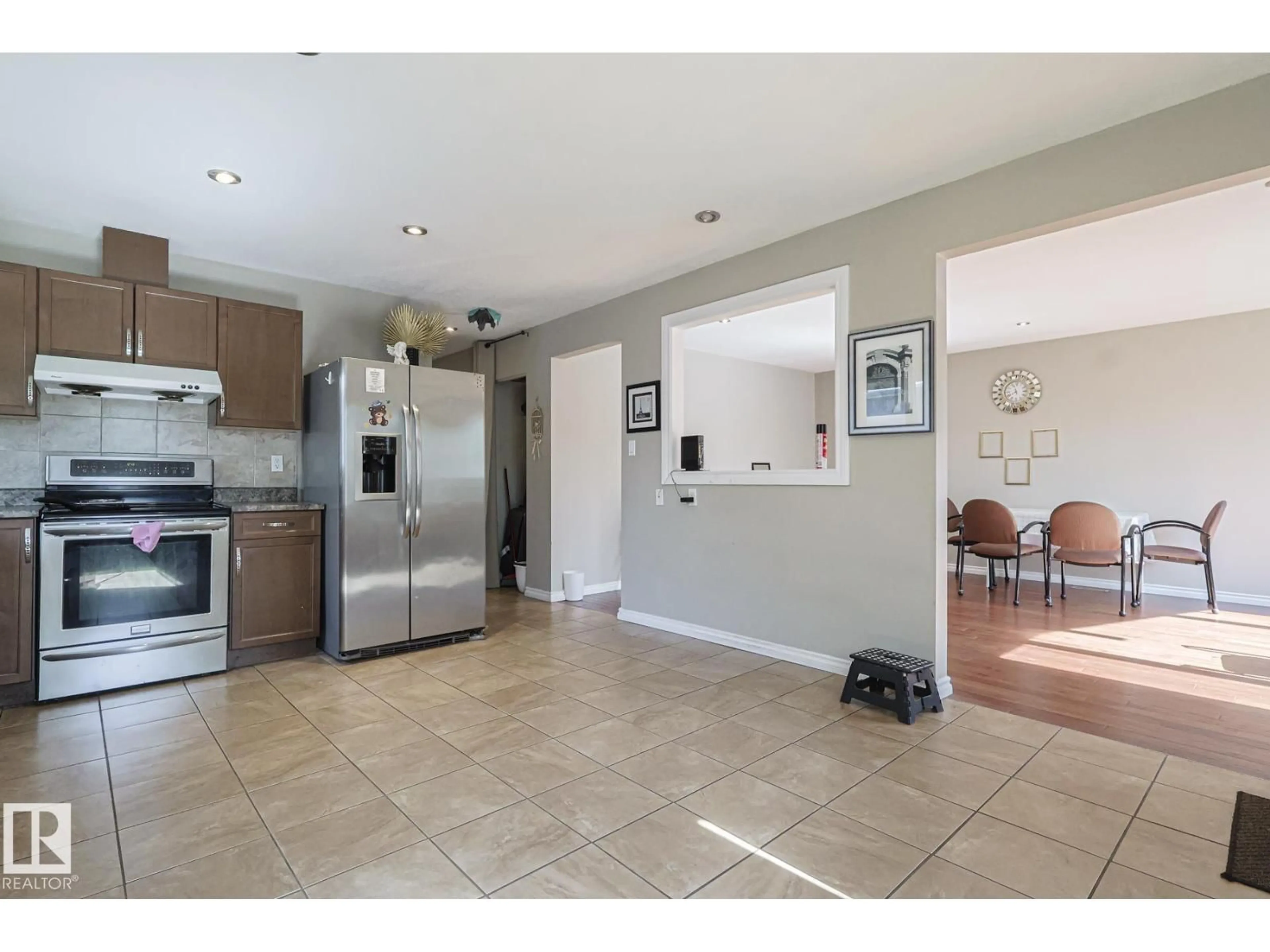 Open concept kitchen, ceramic/tile floor for 9308A & 9308B 109A AV, Edmonton Alberta T5H1E8