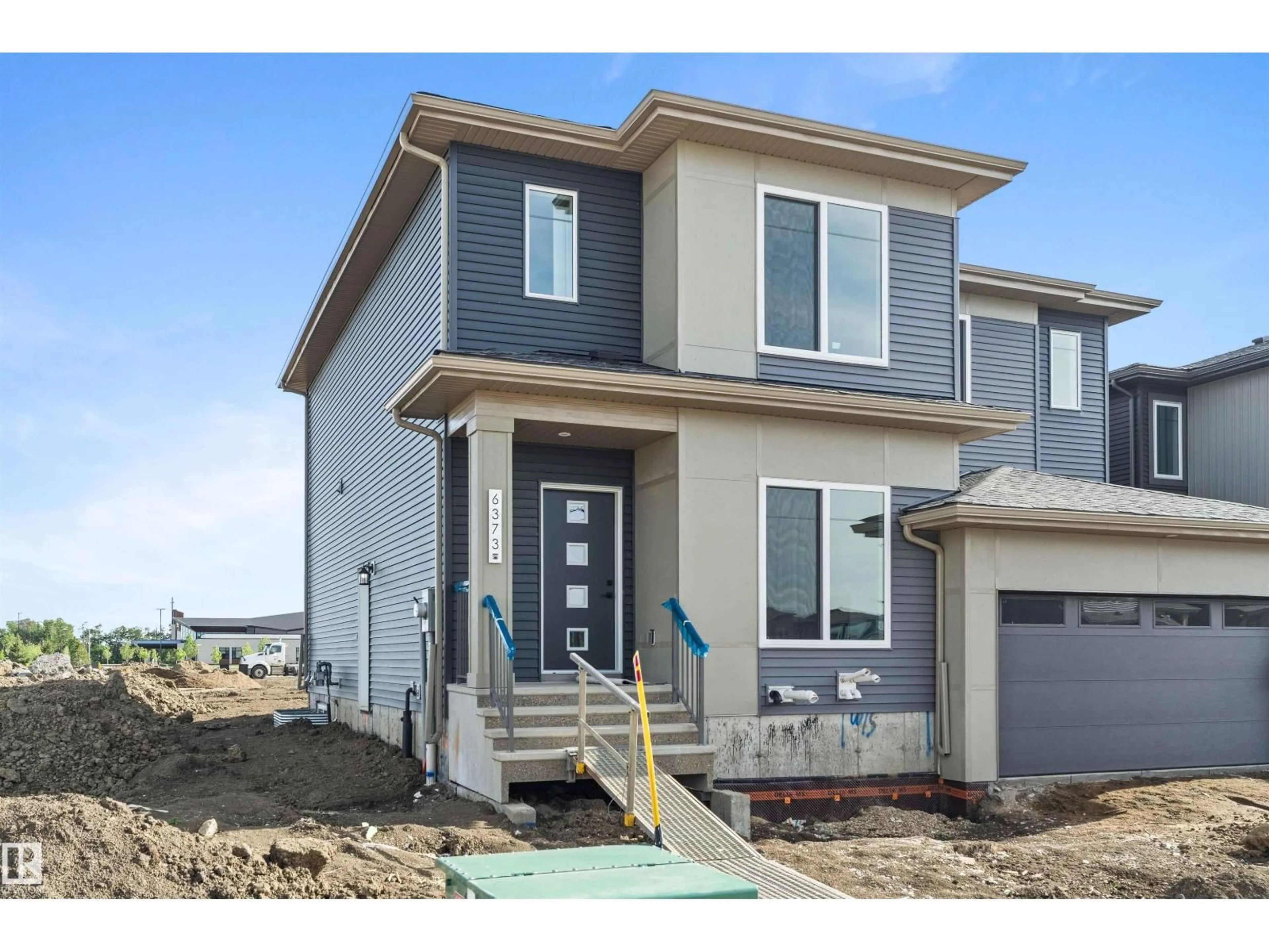Home with vinyl exterior material, street for SW - 6373 KING WD, Edmonton Alberta T6W5J3