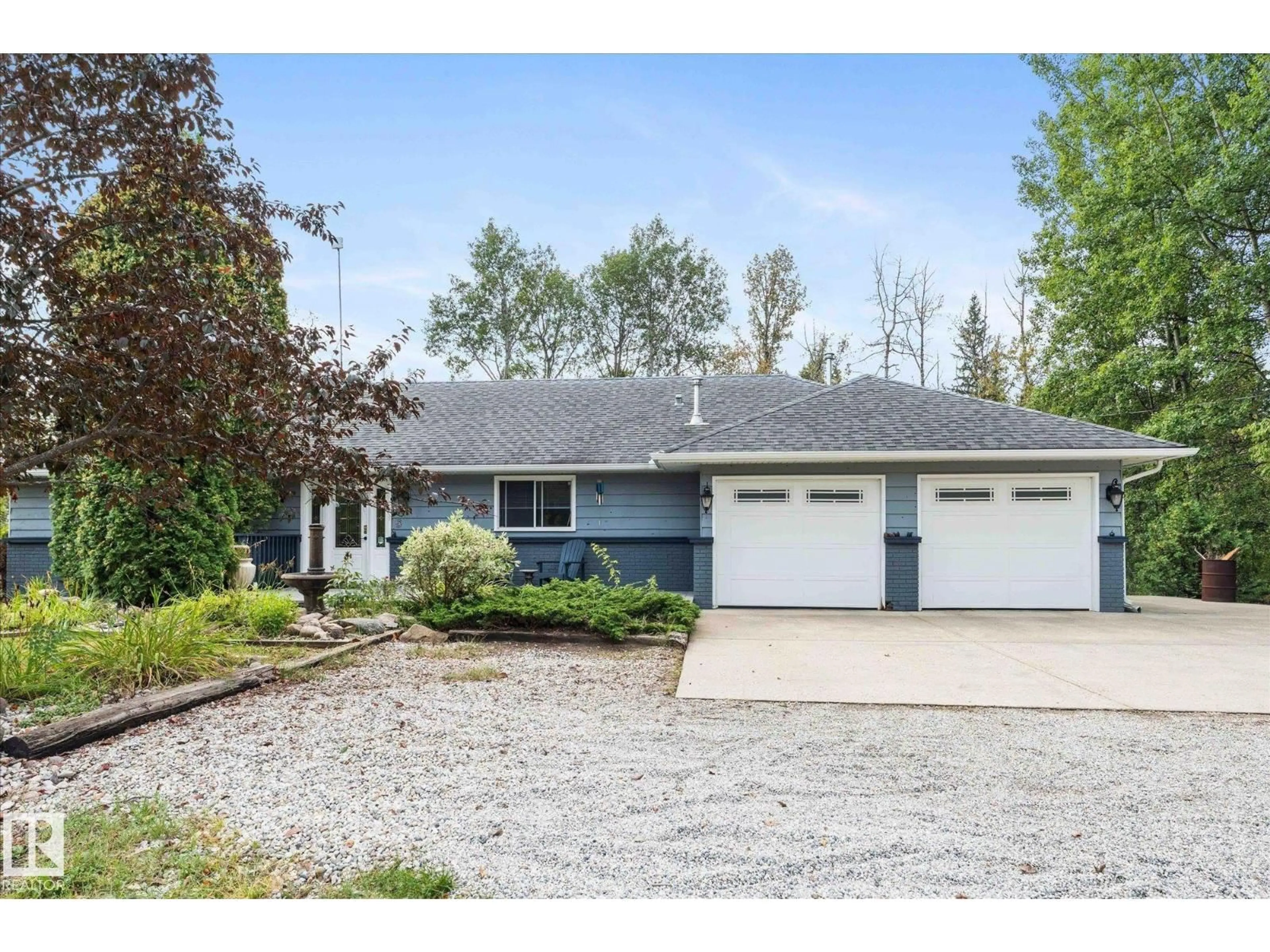 Home with vinyl exterior material, street for 5 - 53104 RGE RD 13, Rural Parkland County Alberta T7Y2T2