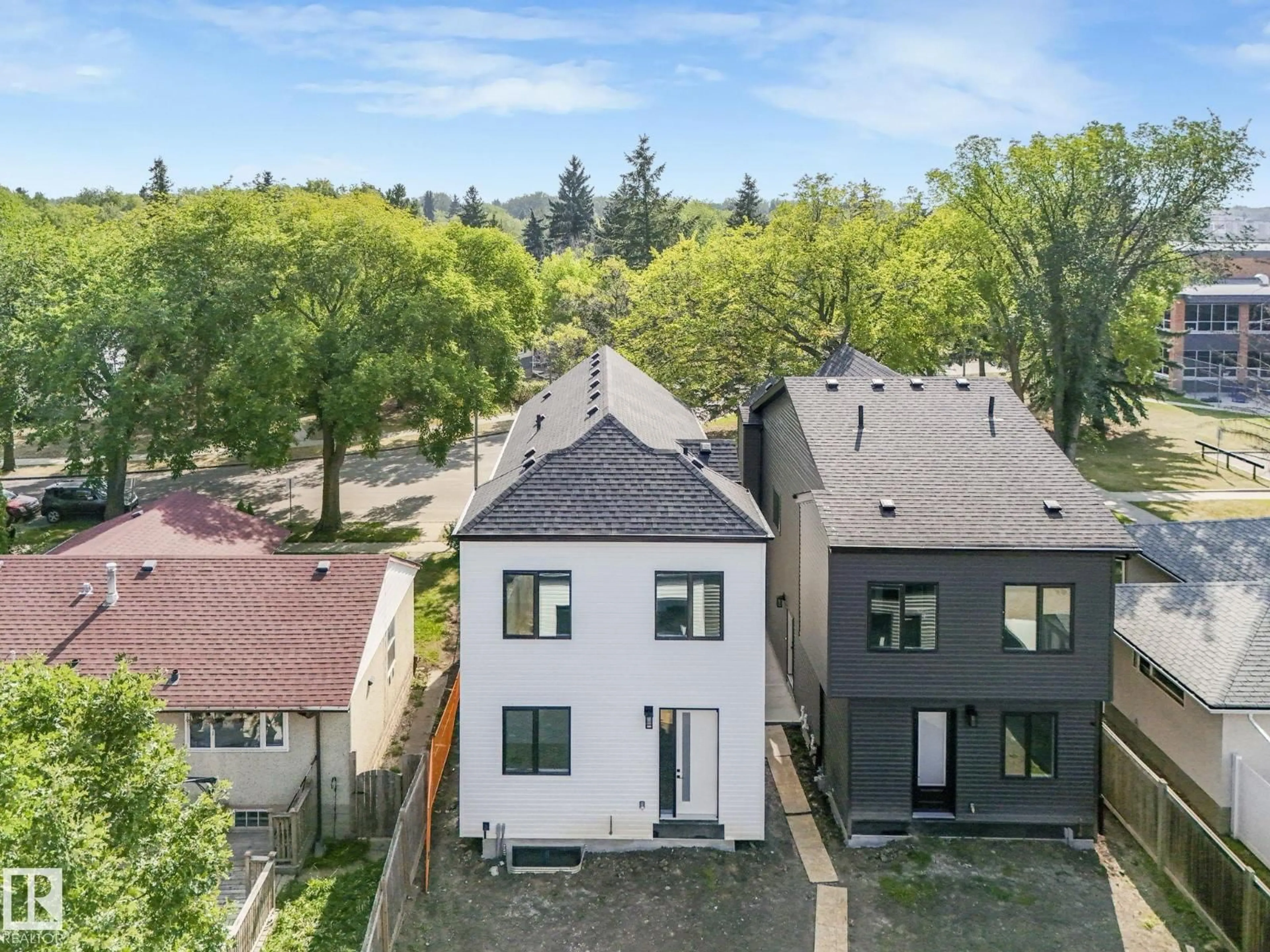 A pic from outside/outdoor area/front of a property/back of a property/a pic from drone, street for 7940 89 AV, Edmonton Alberta T6C1N5