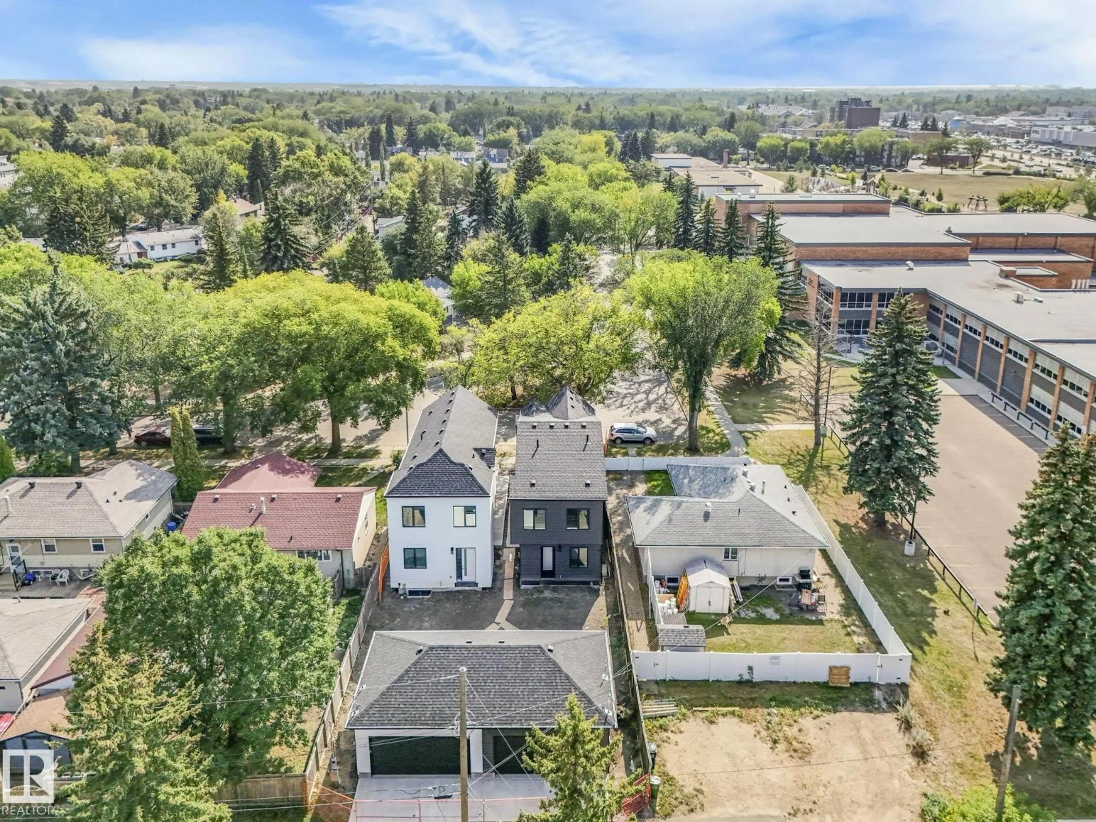A pic from outside/outdoor area/front of a property/back of a property/a pic from drone, street for NW - 7942 89 AV, Edmonton Alberta T6C1N5