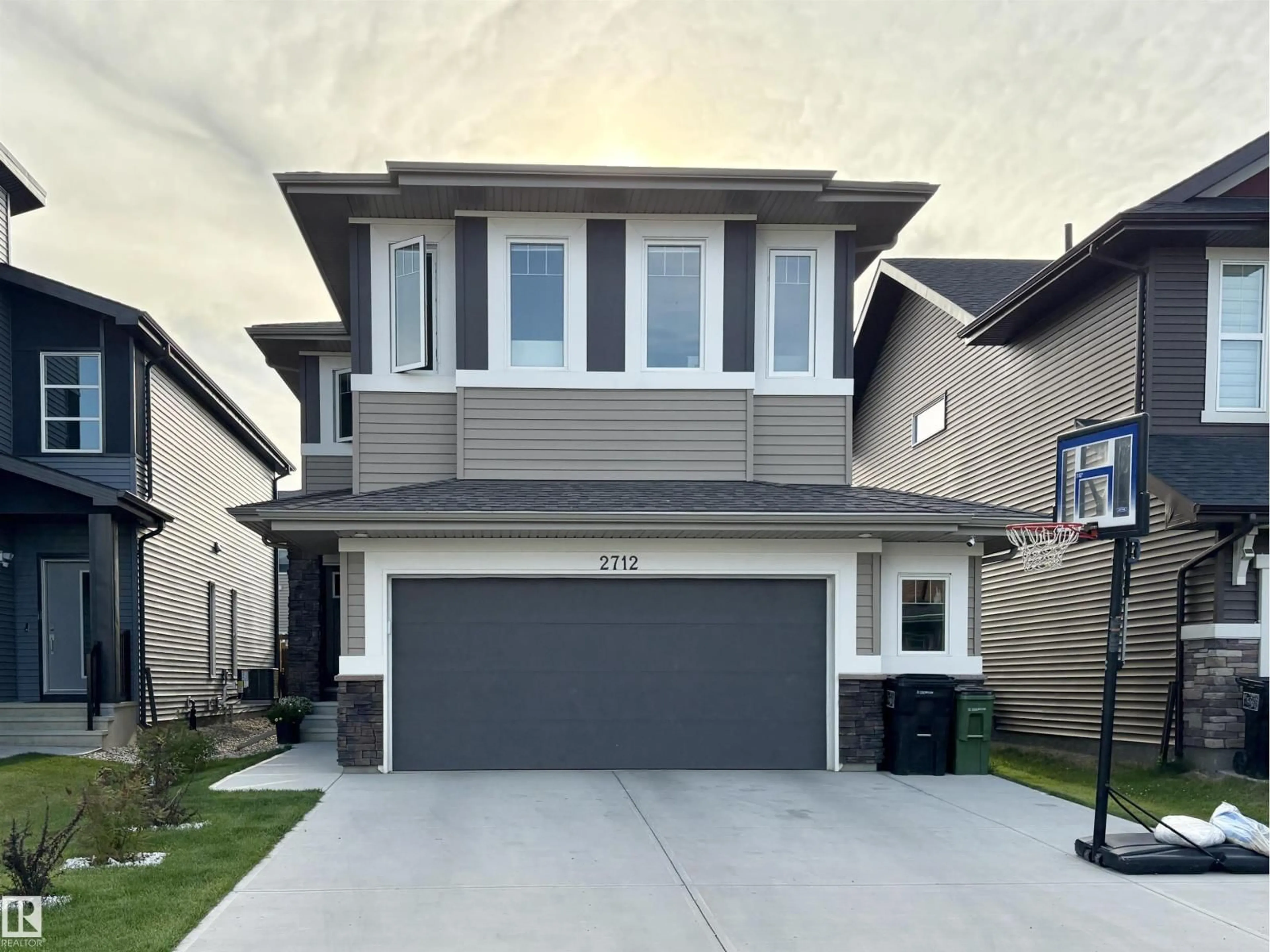 Home with vinyl exterior material, street for NW - 2712 194 ST, Edmonton Alberta T6M1K9