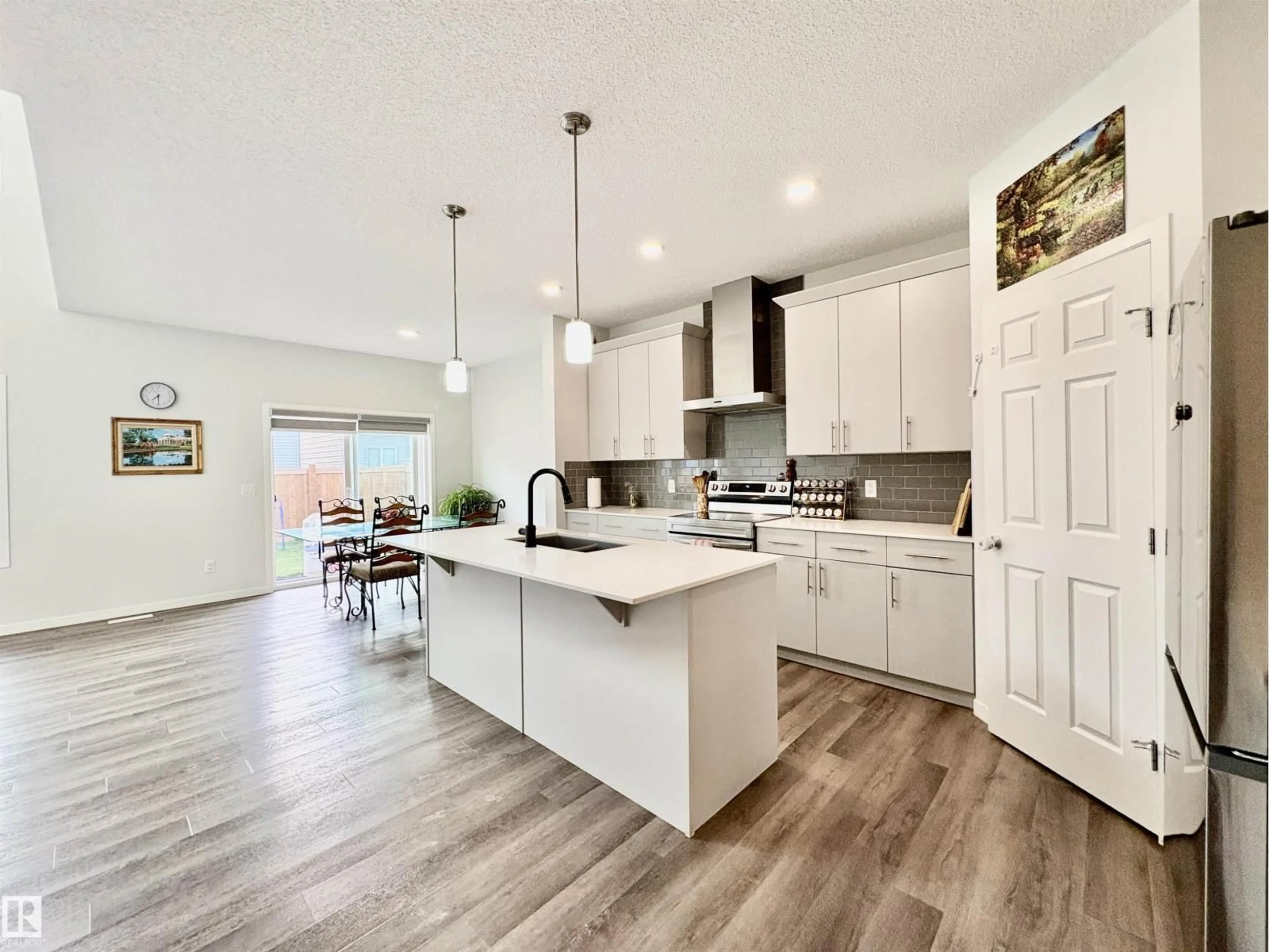 Open concept kitchen, unknown for NW - 2712 194 ST, Edmonton Alberta T6M1K9