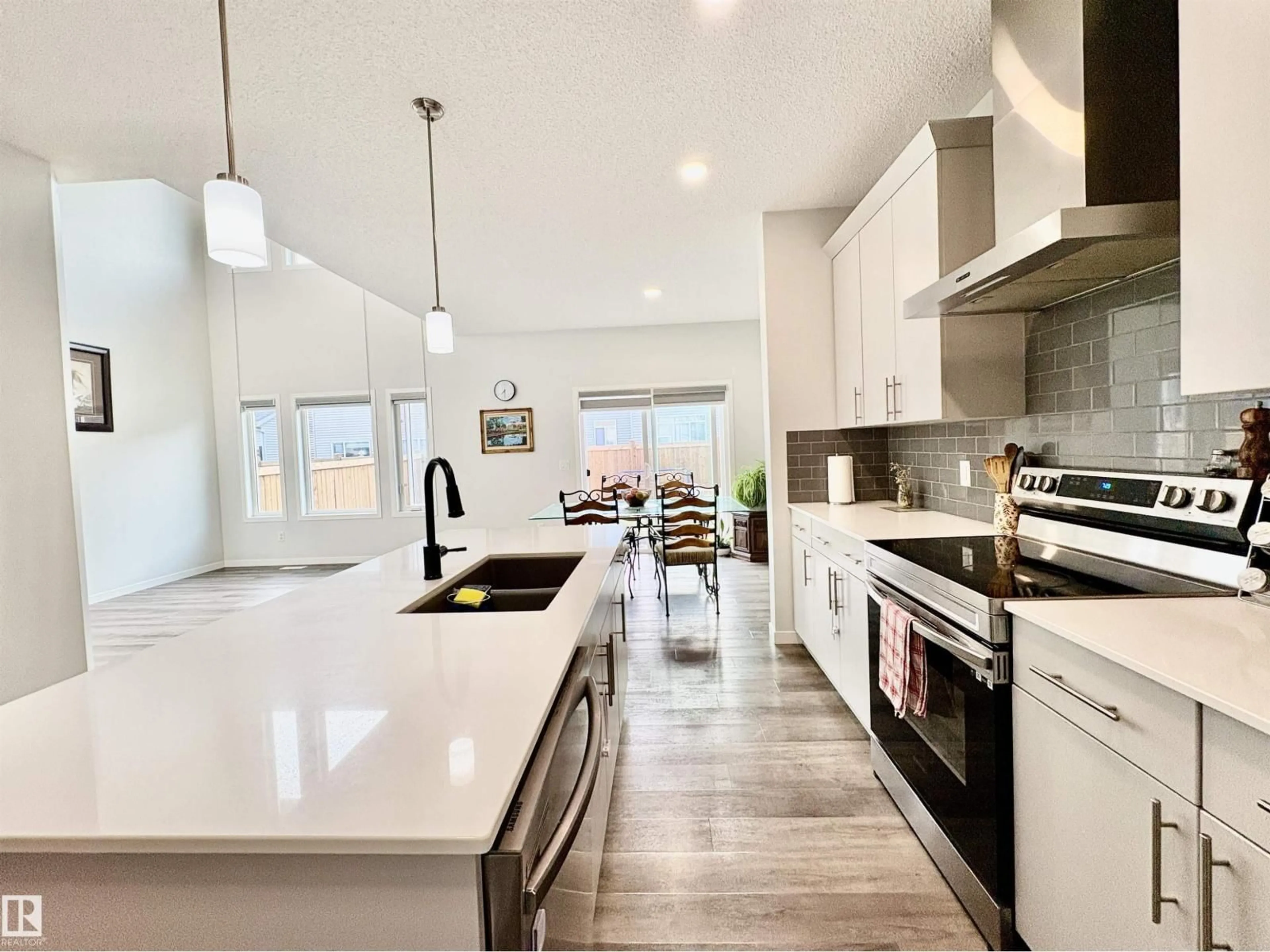 Open concept kitchen, ceramic/tile floor for NW - 2712 194 ST, Edmonton Alberta T6M1K9