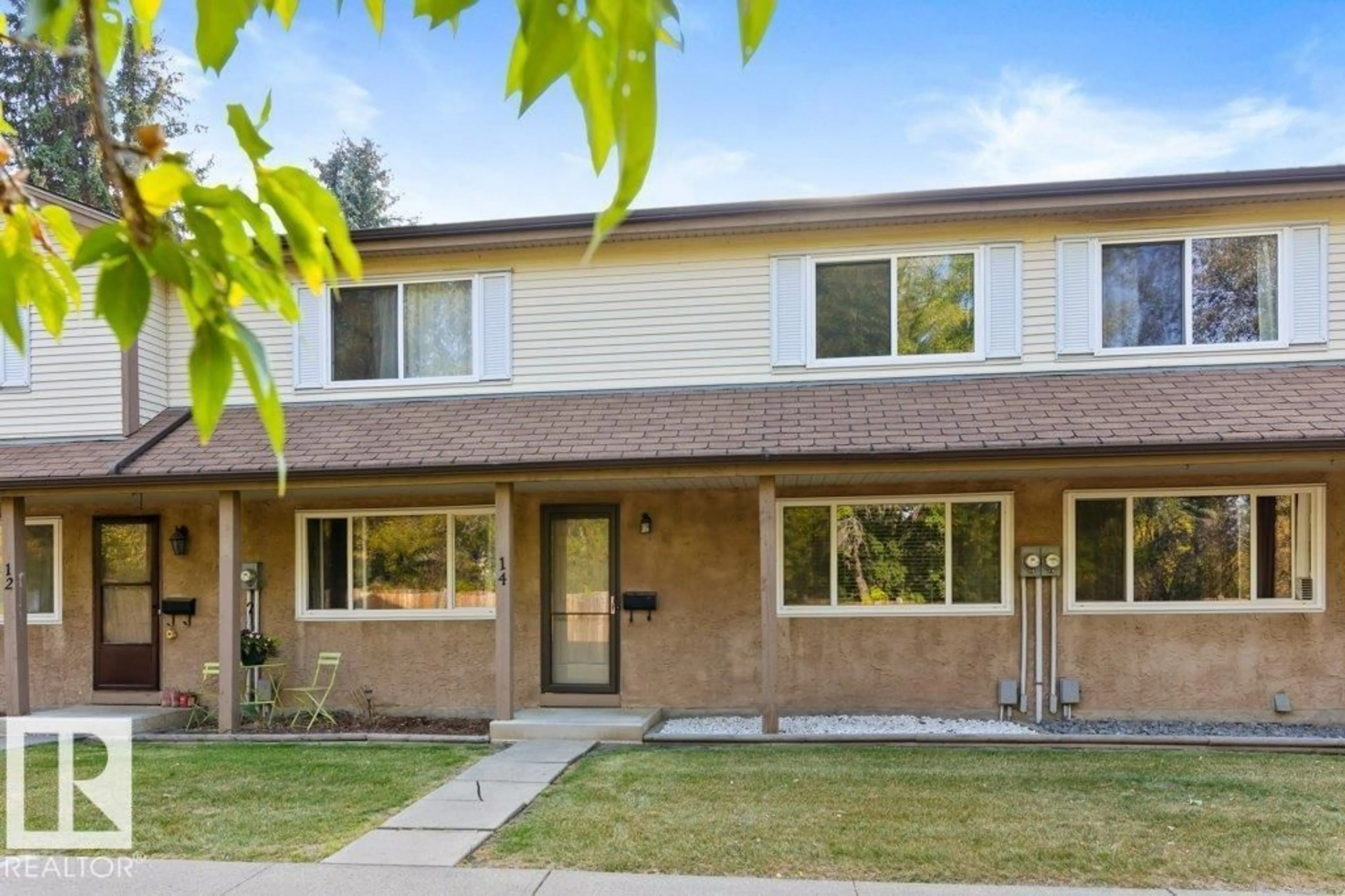 Home with vinyl exterior material, street for 14 WALDEN, St. Albert Alberta T8N3V6