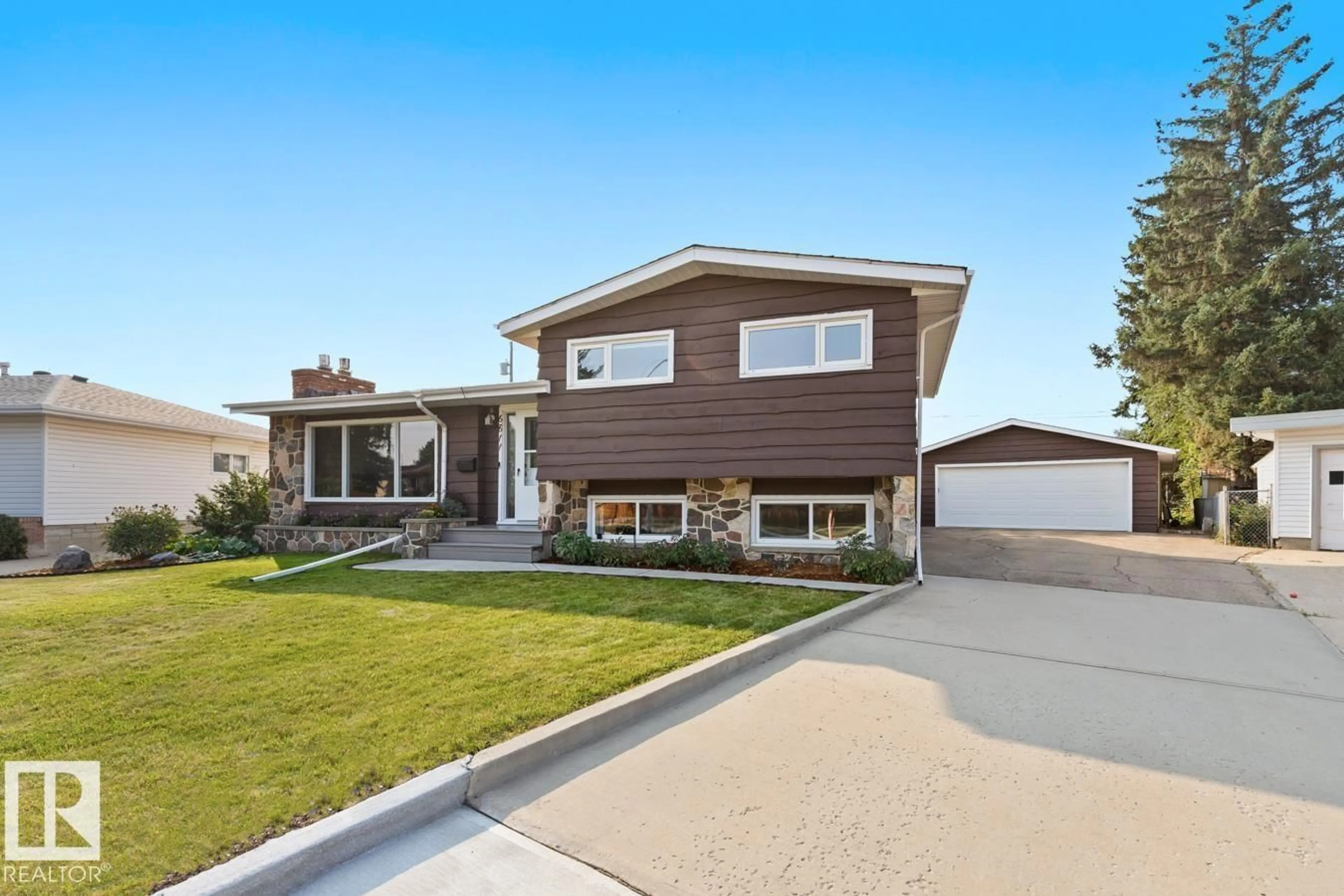 Home with vinyl exterior material, street for 6811 96A AV, Edmonton Alberta T6B1B4