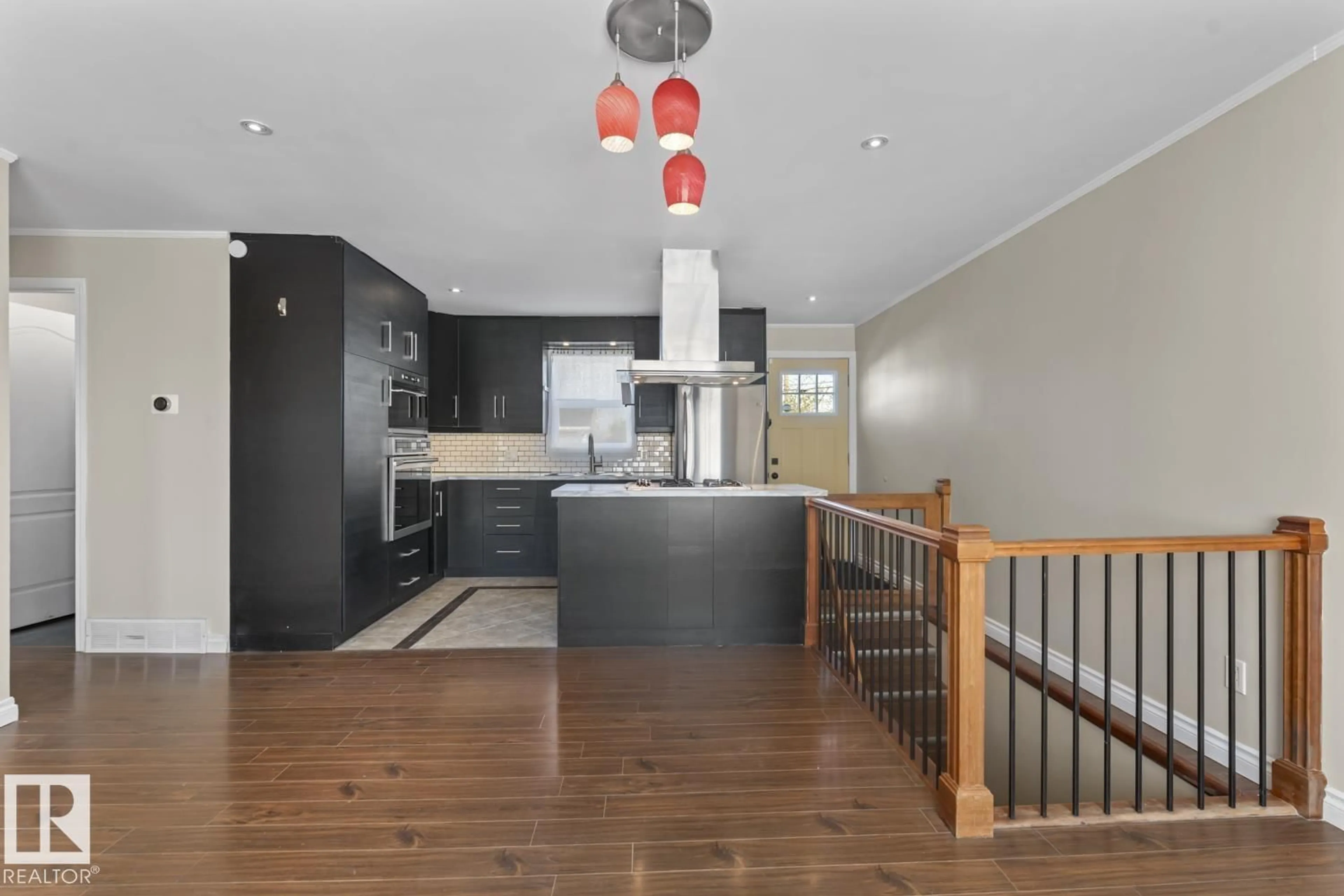 Open concept kitchen, wood/laminate floor for 5508 51 AVENUE, Cold Lake Alberta T9M1R1