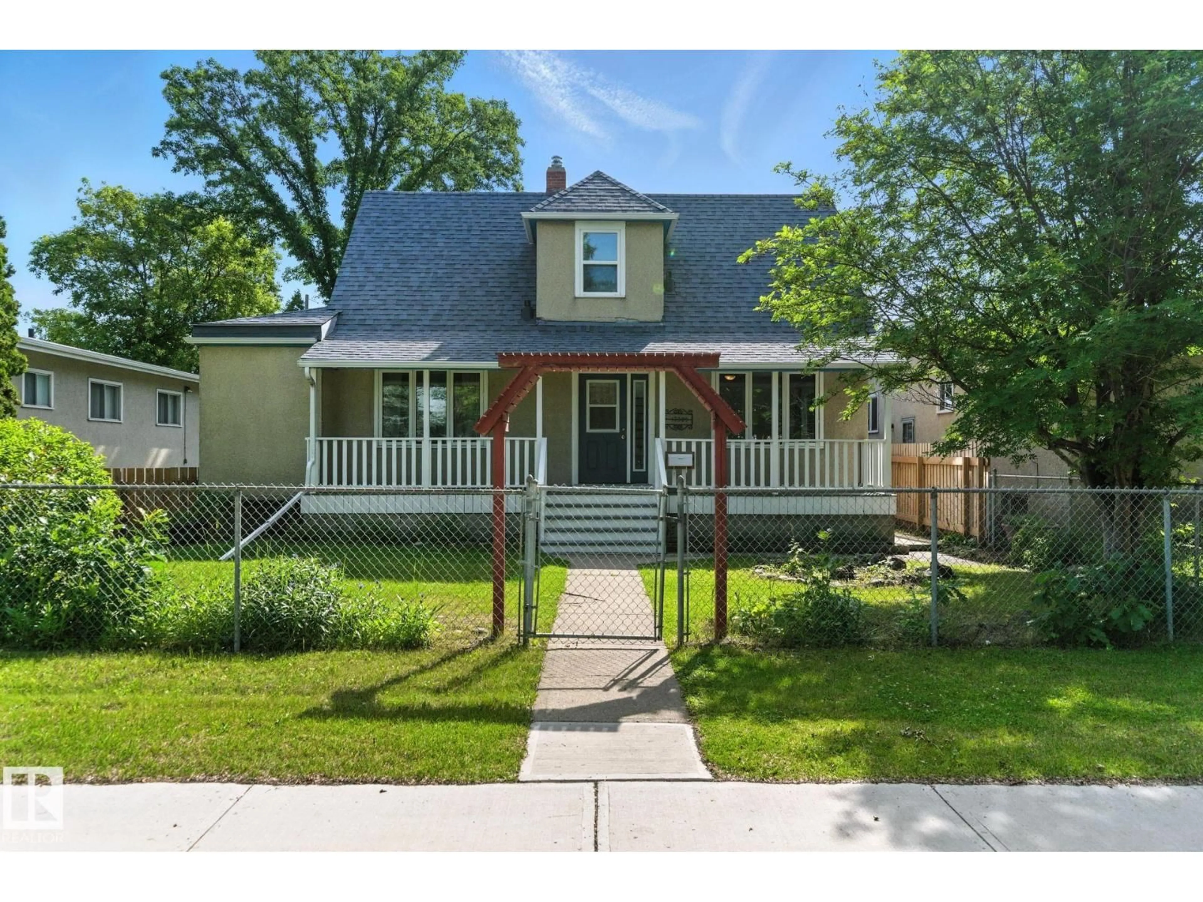 Home with vinyl exterior material, street for 12509 81 ST, Edmonton Alberta T5B2T8