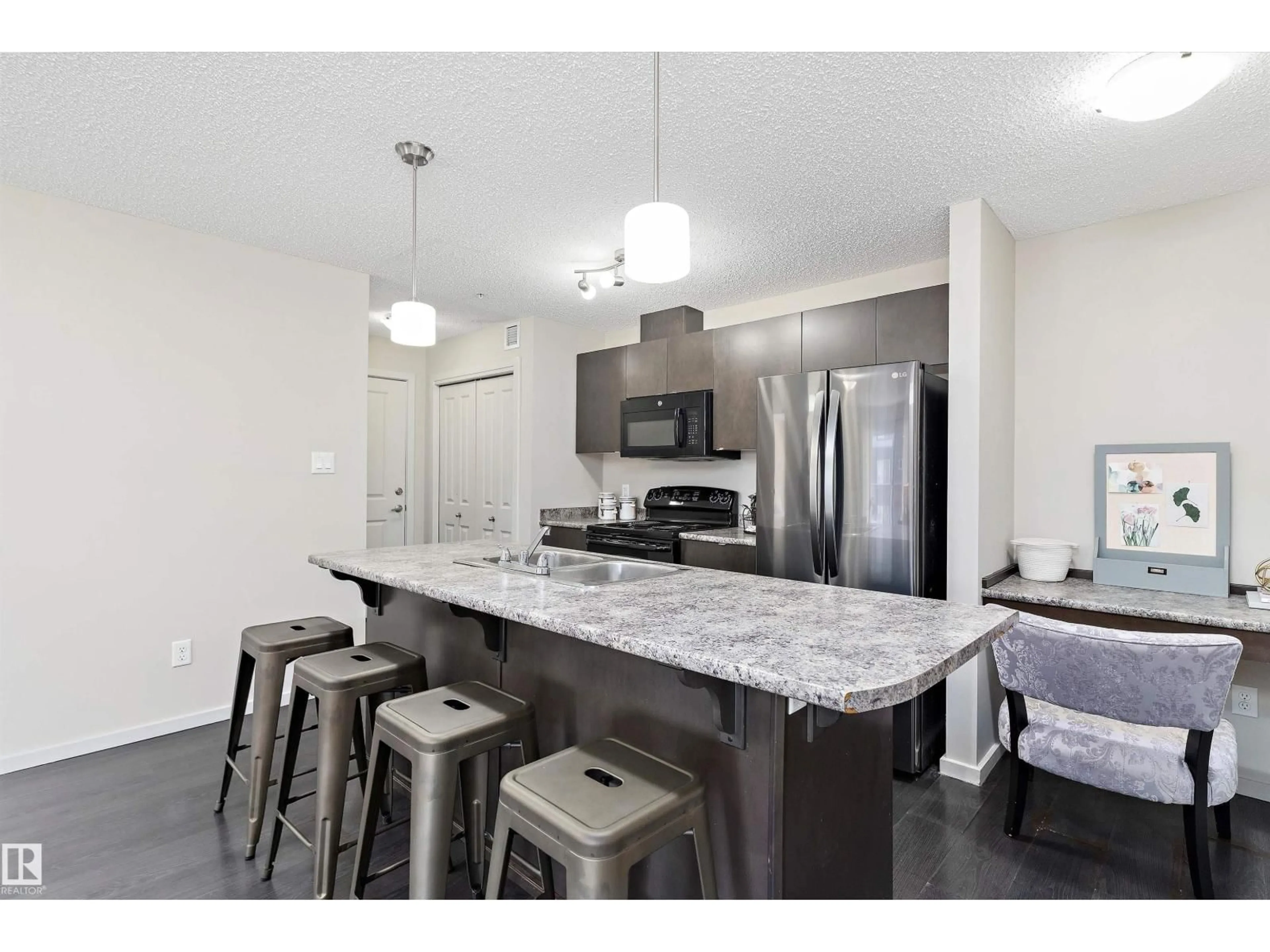 Open concept kitchen, ceramic/tile floor for 219 - 344 WINDERMERE ROAD, Edmonton Alberta T6W2P2