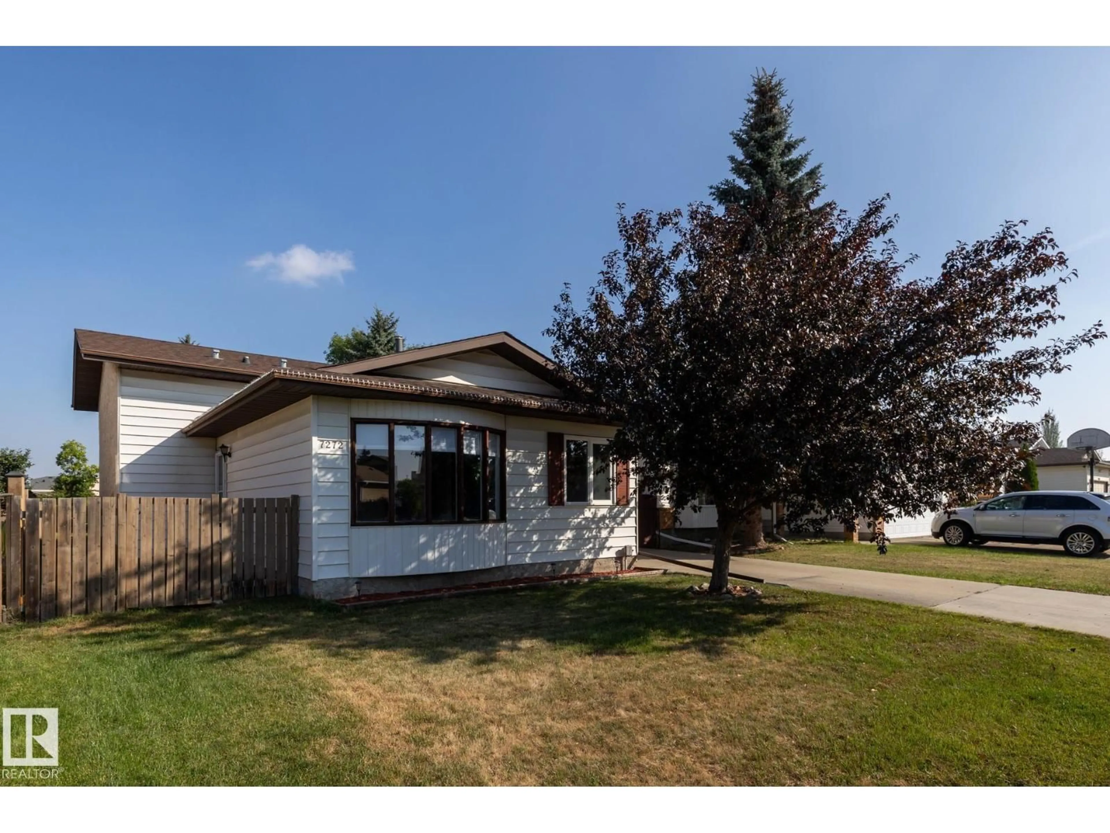 Home with vinyl exterior material, street for 7272 152C AV, Edmonton Alberta T5C3N2
