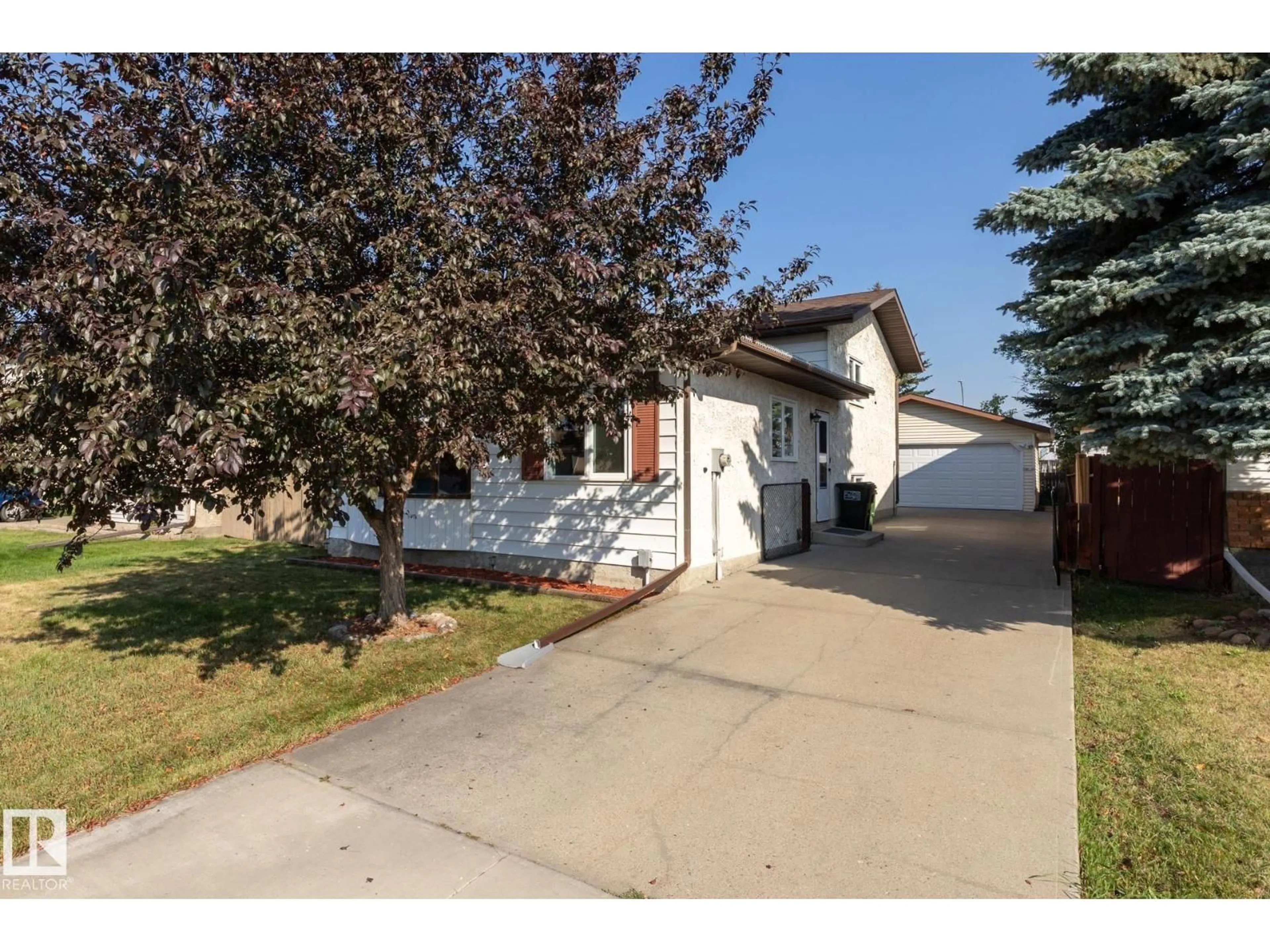 Home with vinyl exterior material, street for 7272 152C AV, Edmonton Alberta T5C3N2