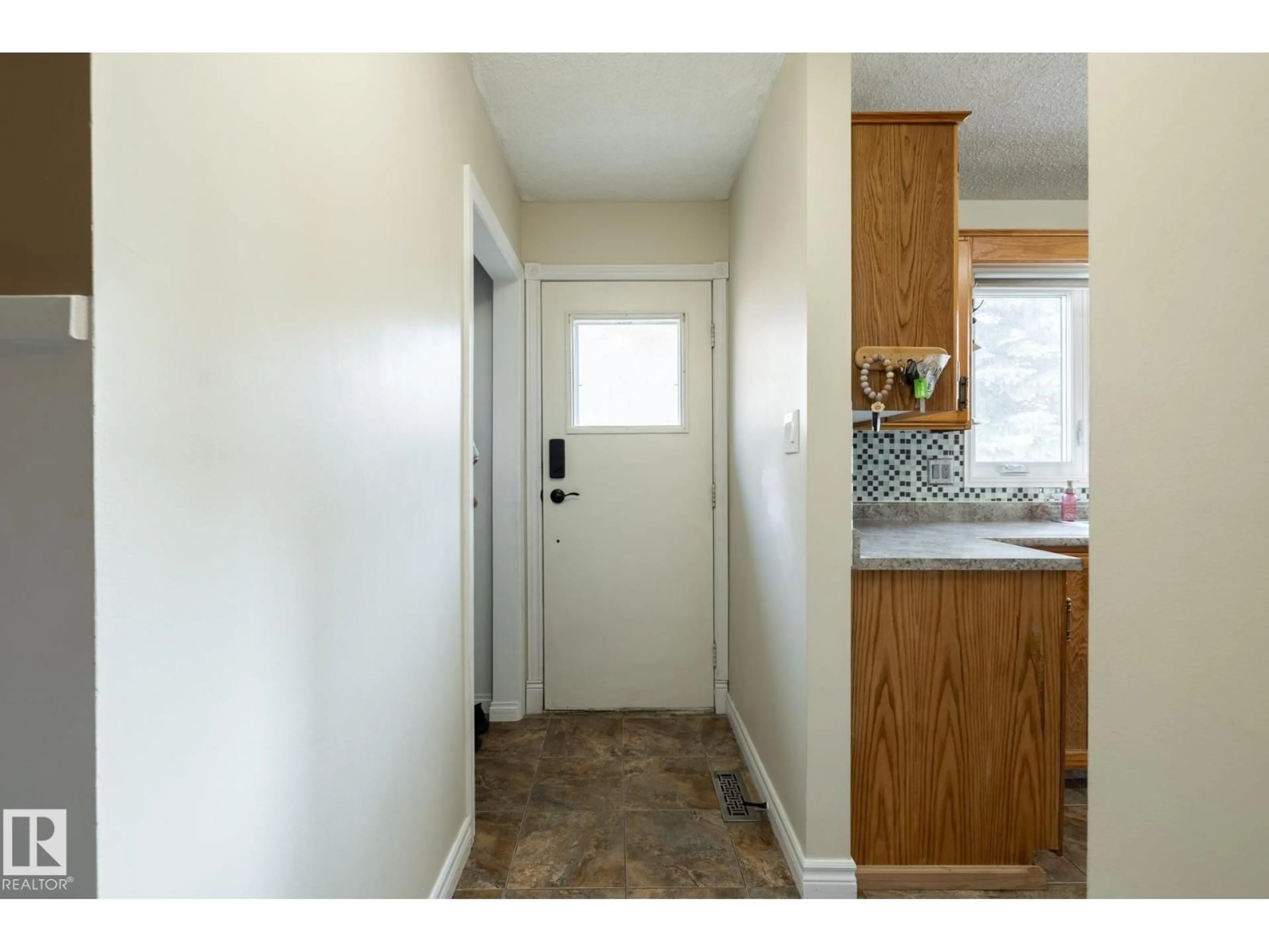 Indoor entryway for 7272 152C AV, Edmonton Alberta T5C3N2