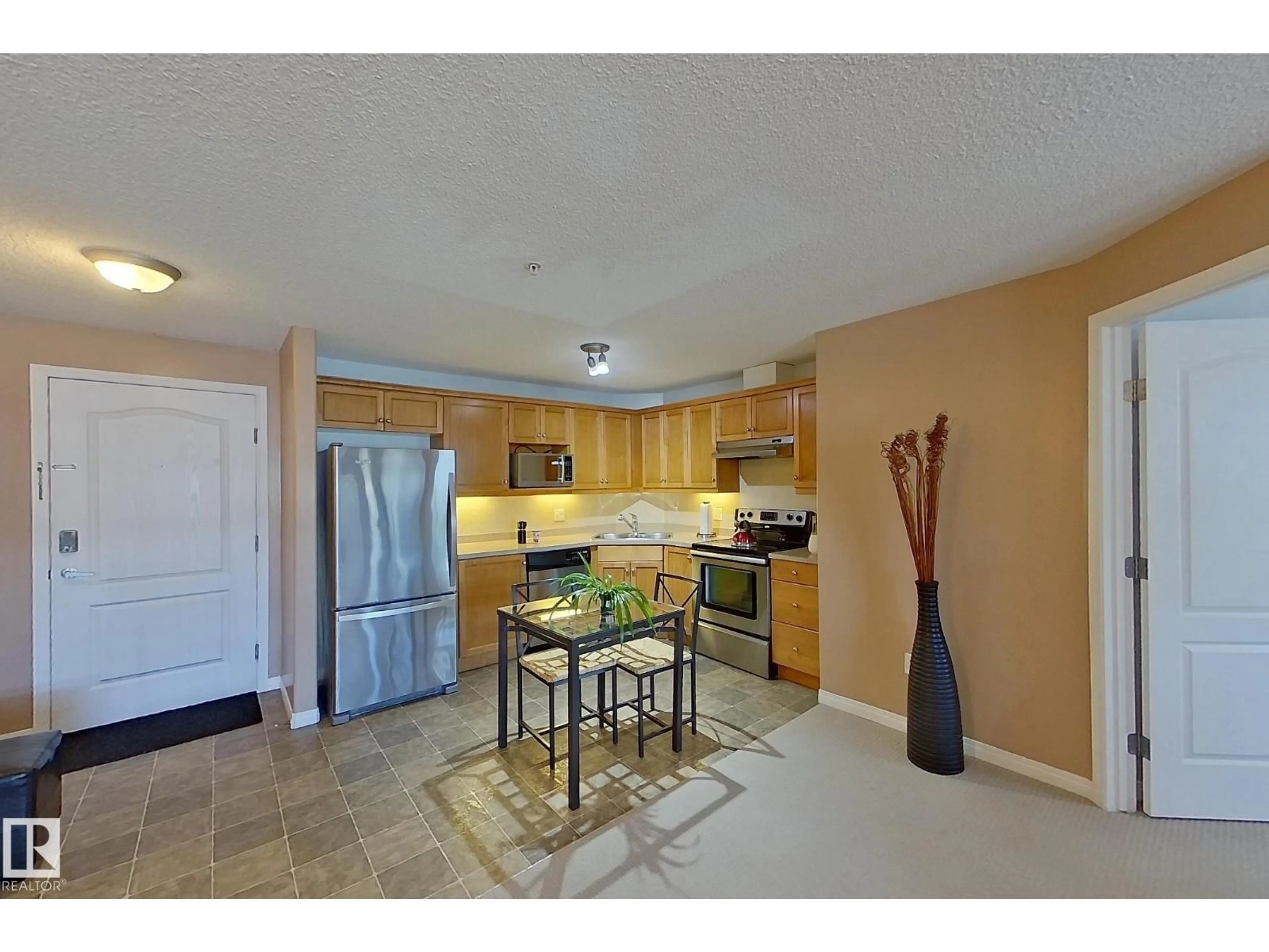 Open concept kitchen, ceramic/tile floor for #338 - 1520 HAMMOND GATE, Edmonton Alberta T6M0J4