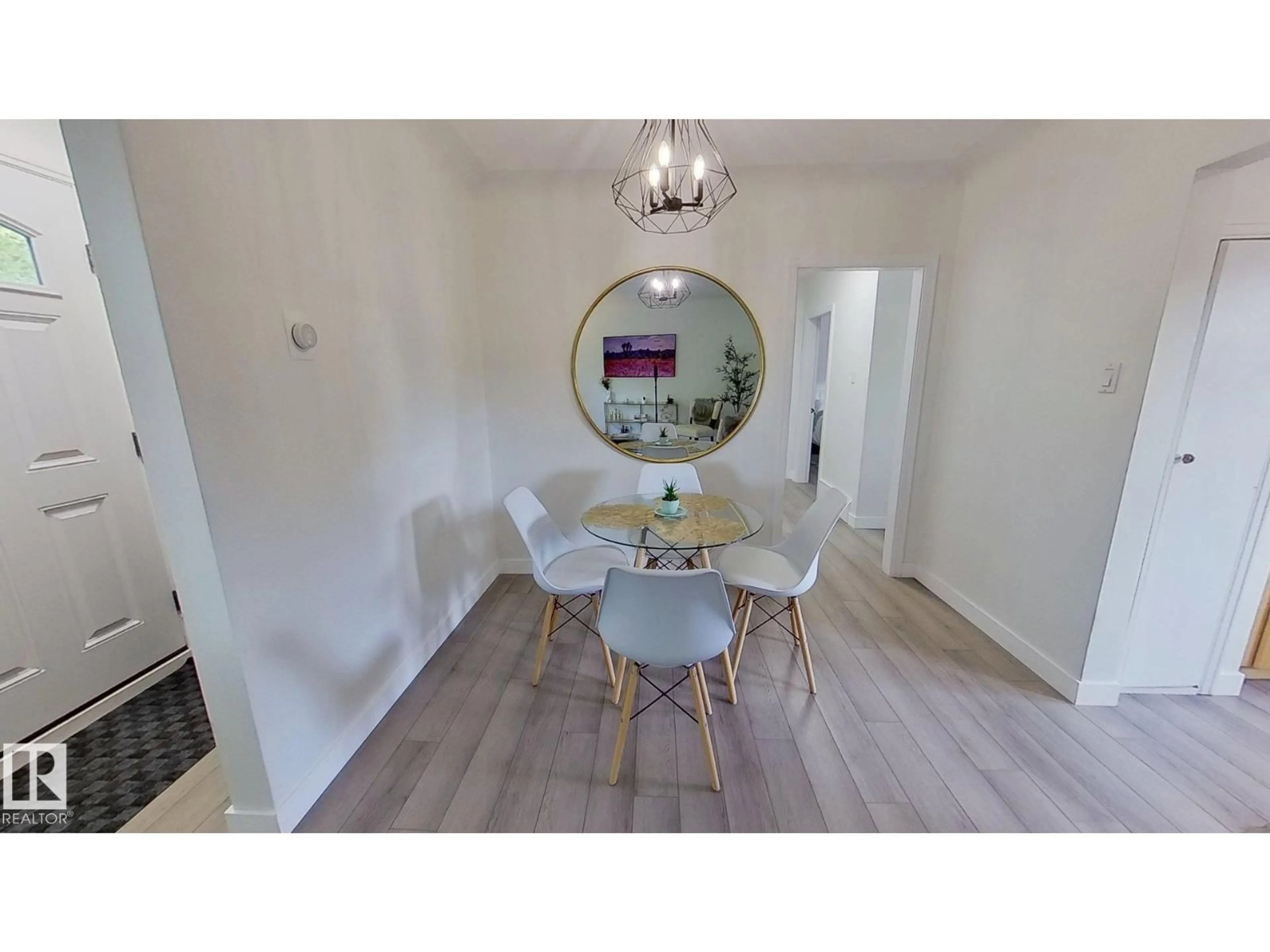 Dining room, wood/laminate floor for 13811 110A AV, Edmonton Alberta T5M2N1