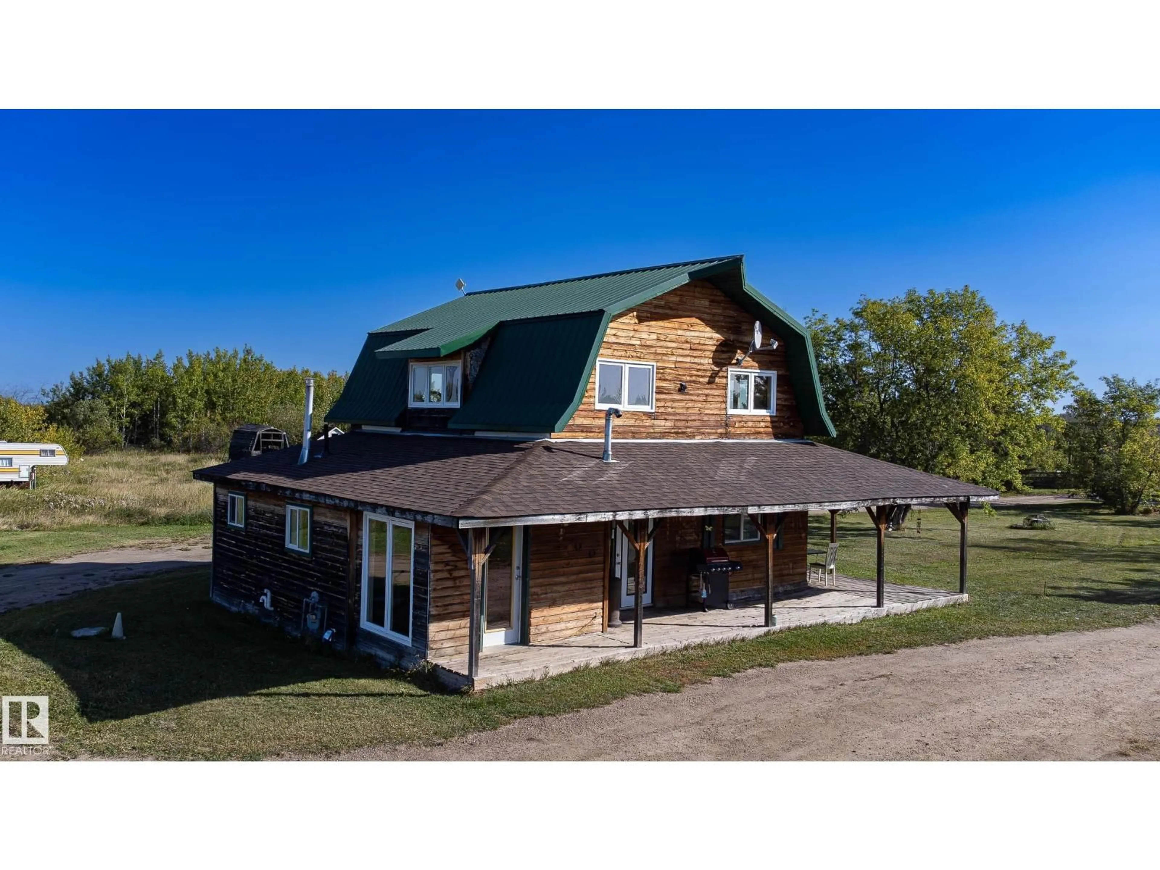 A pic from outside/outdoor area/front of a property/back of a property/a pic from drone, building for 60530 RGE RD 453, Rural Bonnyville M.D. Alberta T9N2G3