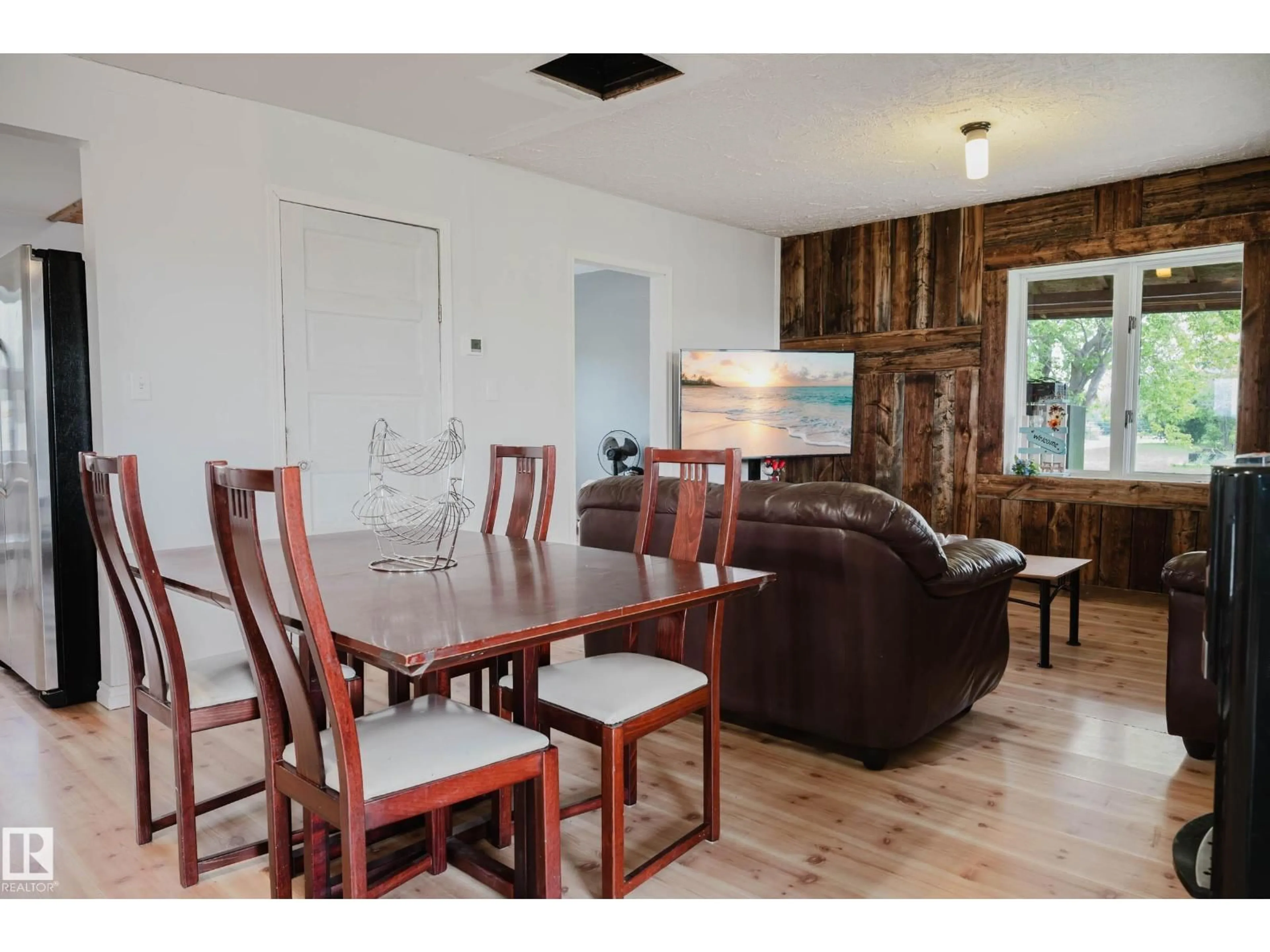 Dining room, wood/laminate floor for 60530 RGE RD 453, Rural Bonnyville M.D. Alberta T9N2G3