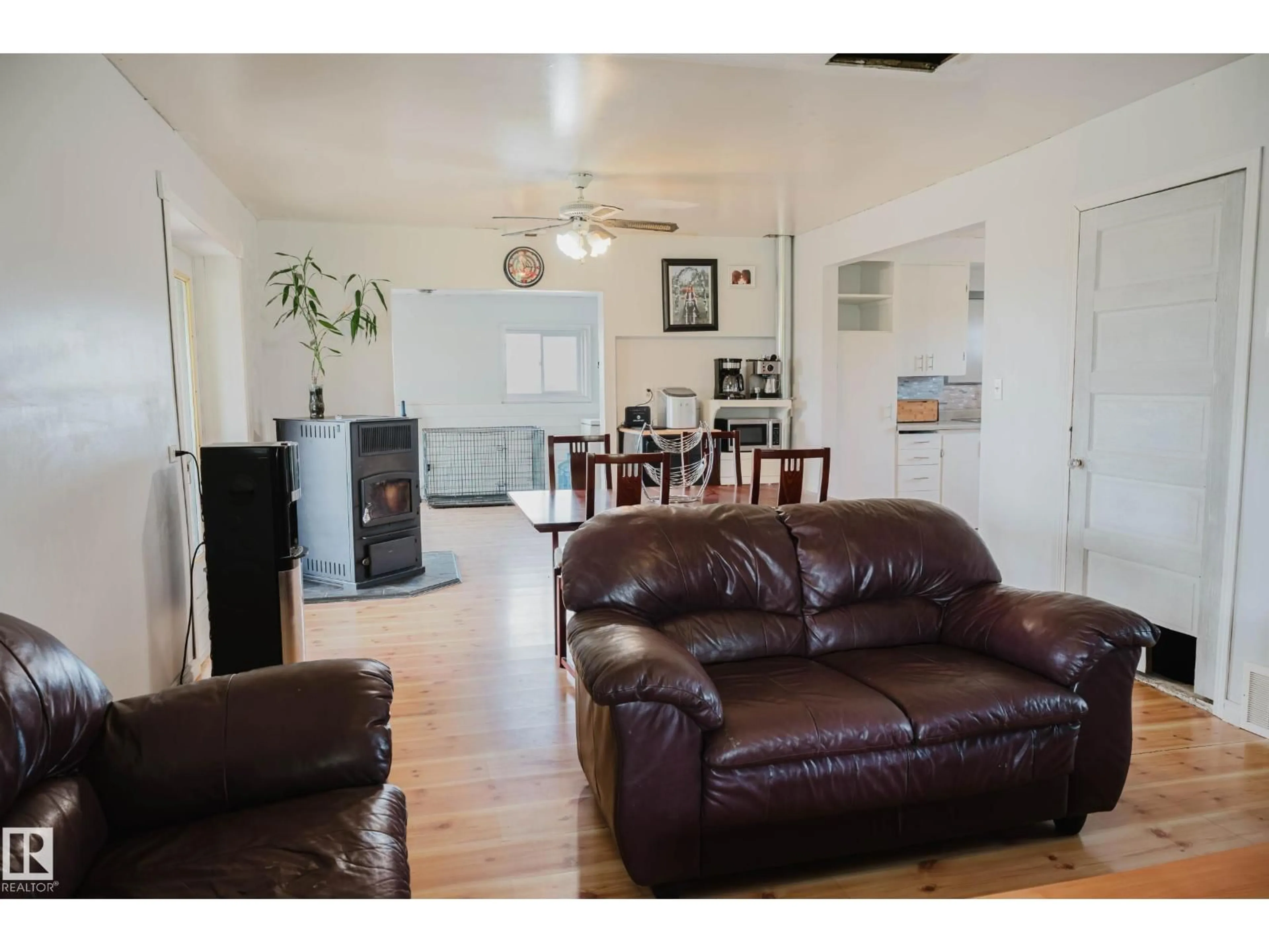 Living room with furniture, wood/laminate floor for 60530 RGE RD 453, Rural Bonnyville M.D. Alberta T9N2G3