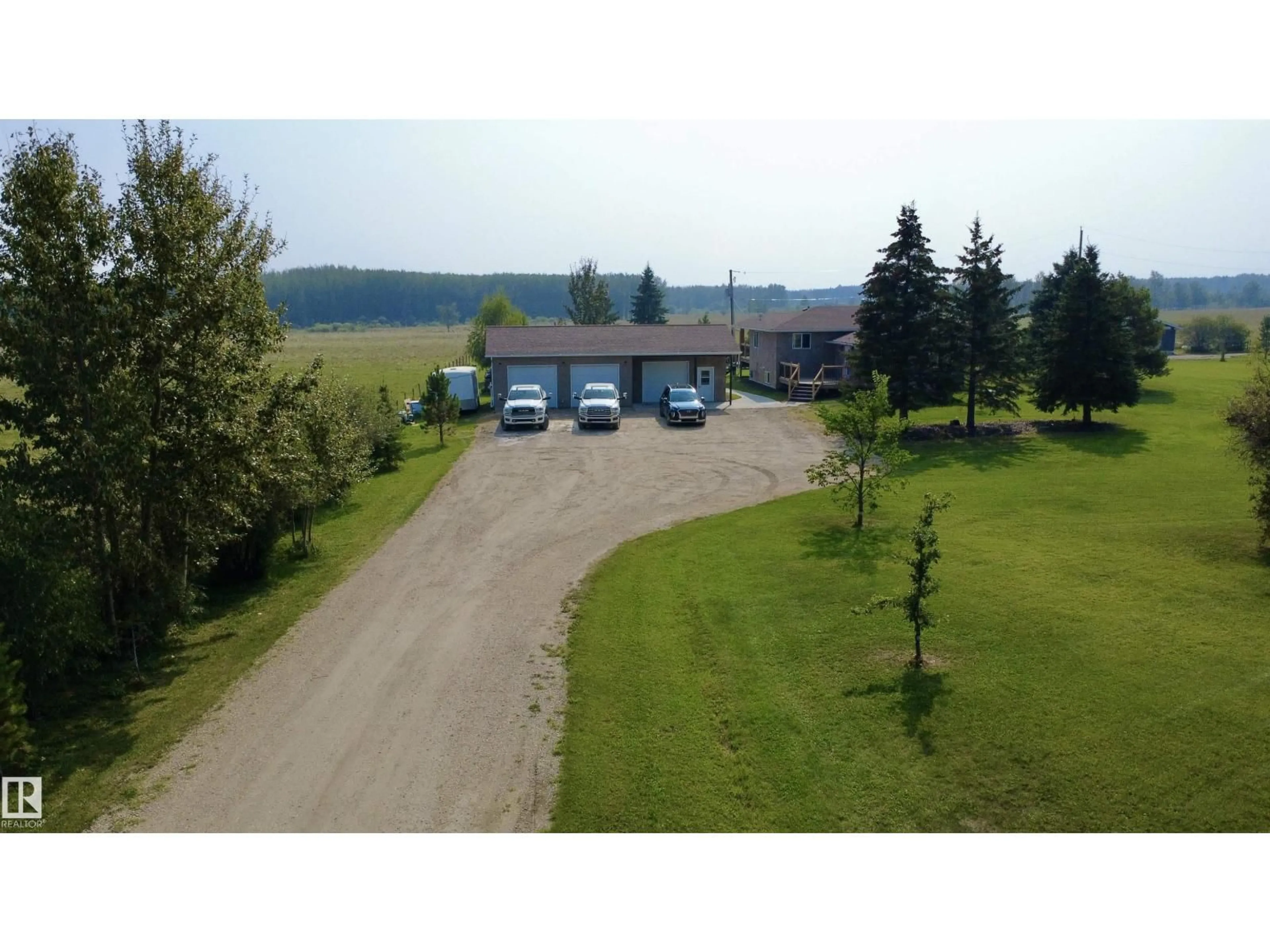 A pic from outside/outdoor area/front of a property/back of a property/a pic from drone, water/lake/river/ocean view for 6519 TWP 474, Rural Brazeau County Alberta T0C0S0