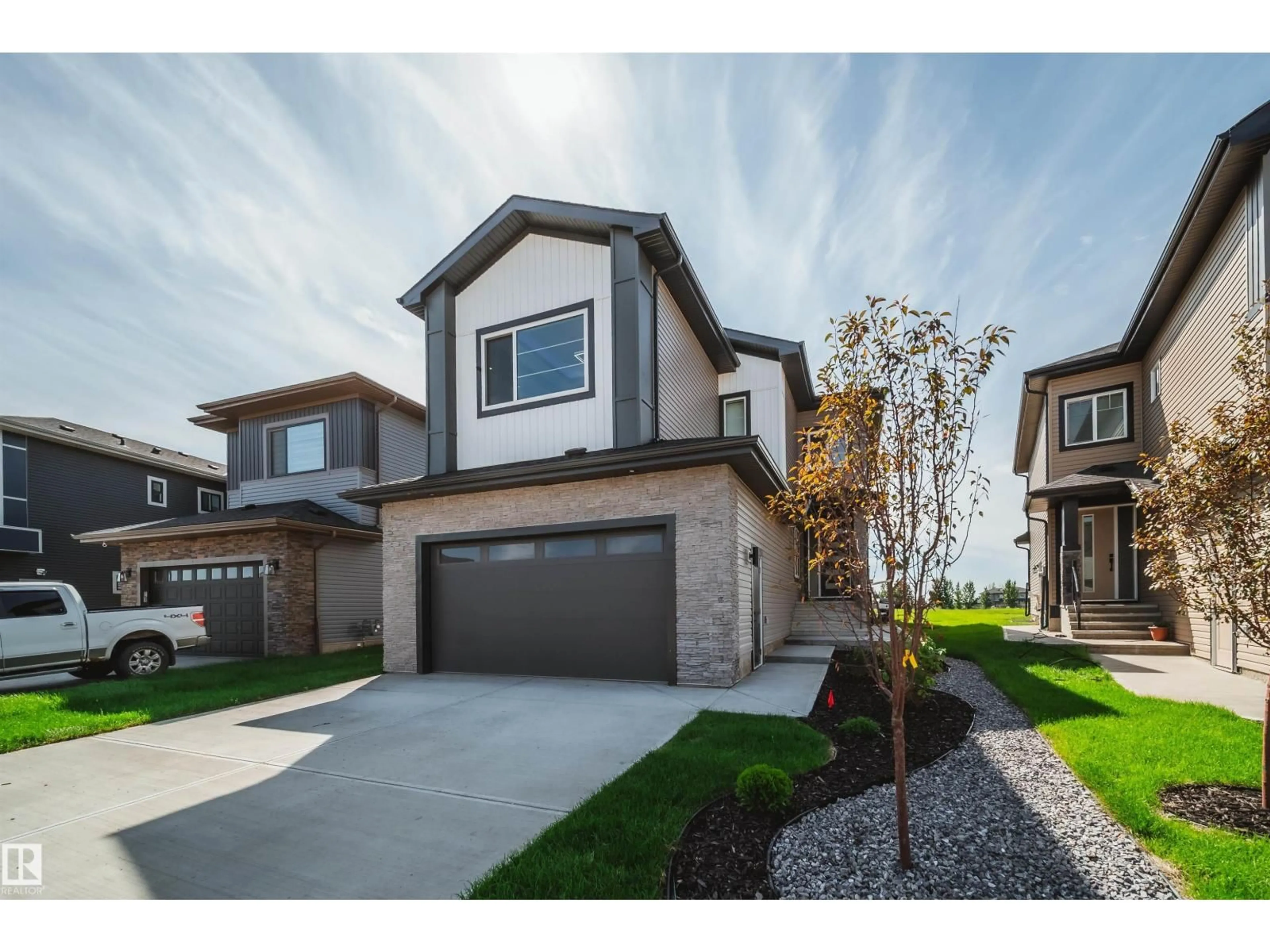 Home with brick exterior material, street for NE - 1831 63 AV, Rural Leduc County Alberta T4X3A4