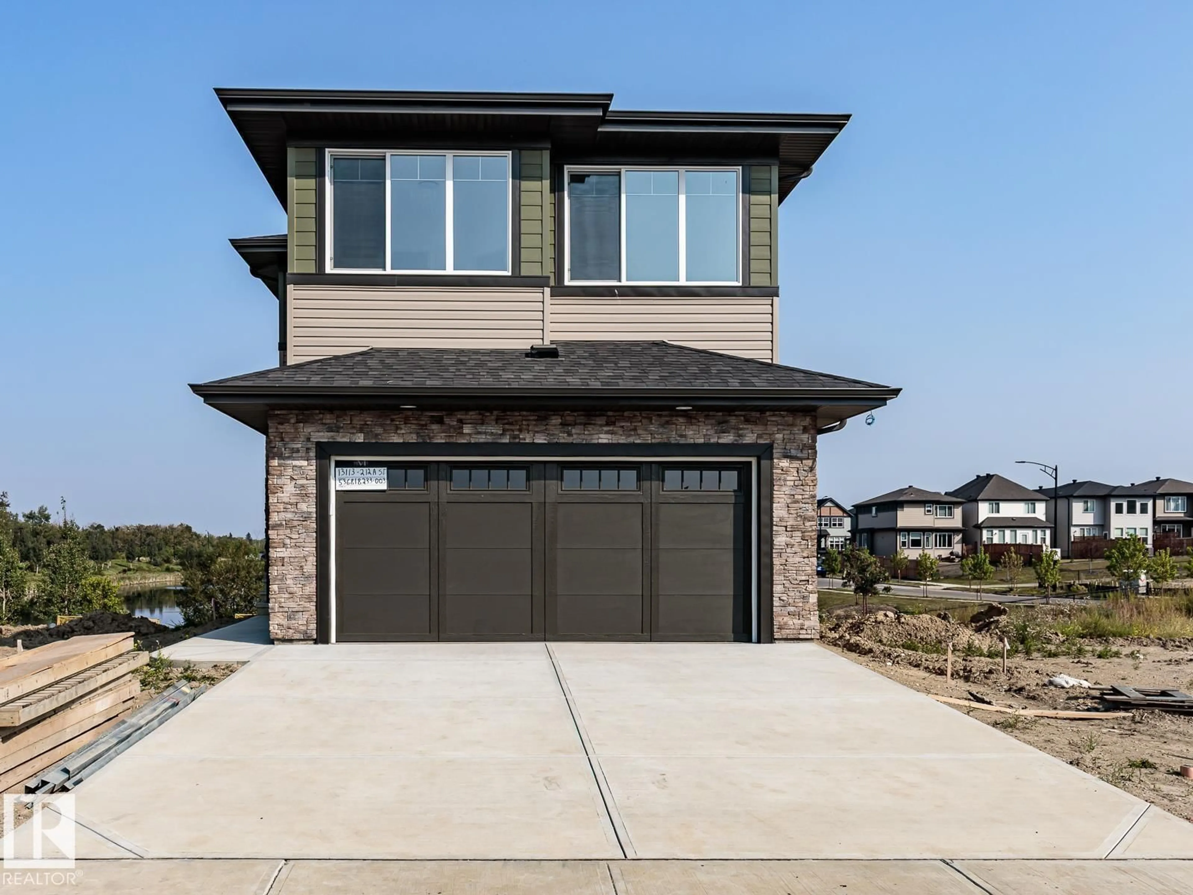 Home with brick exterior material, street for 13113 212A ST, Edmonton Alberta T6W5E1