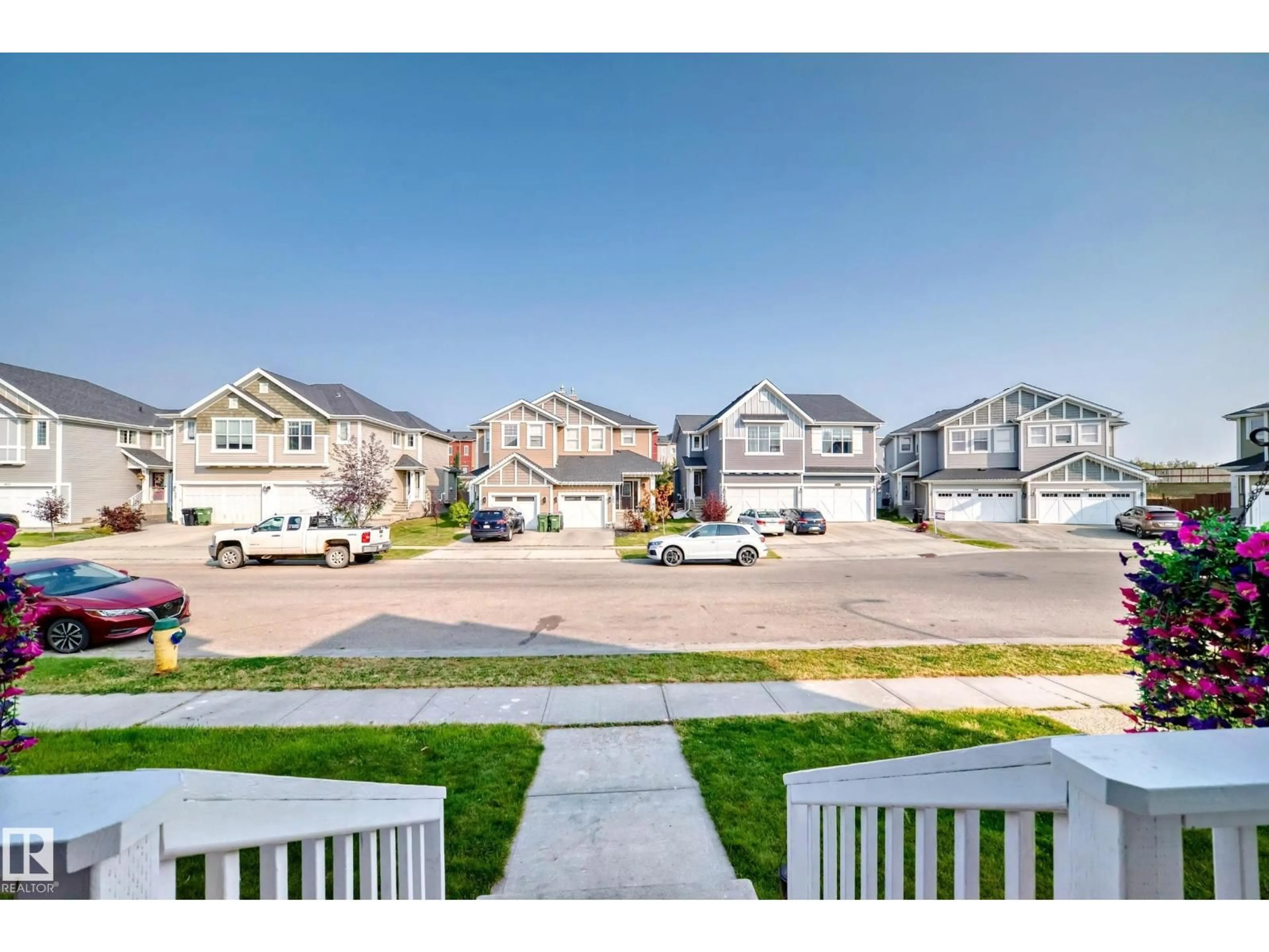 A pic from outside/outdoor area/front of a property/back of a property/a pic from drone, street for 398 SIMMONDS WY, Leduc Alberta T9E0T9