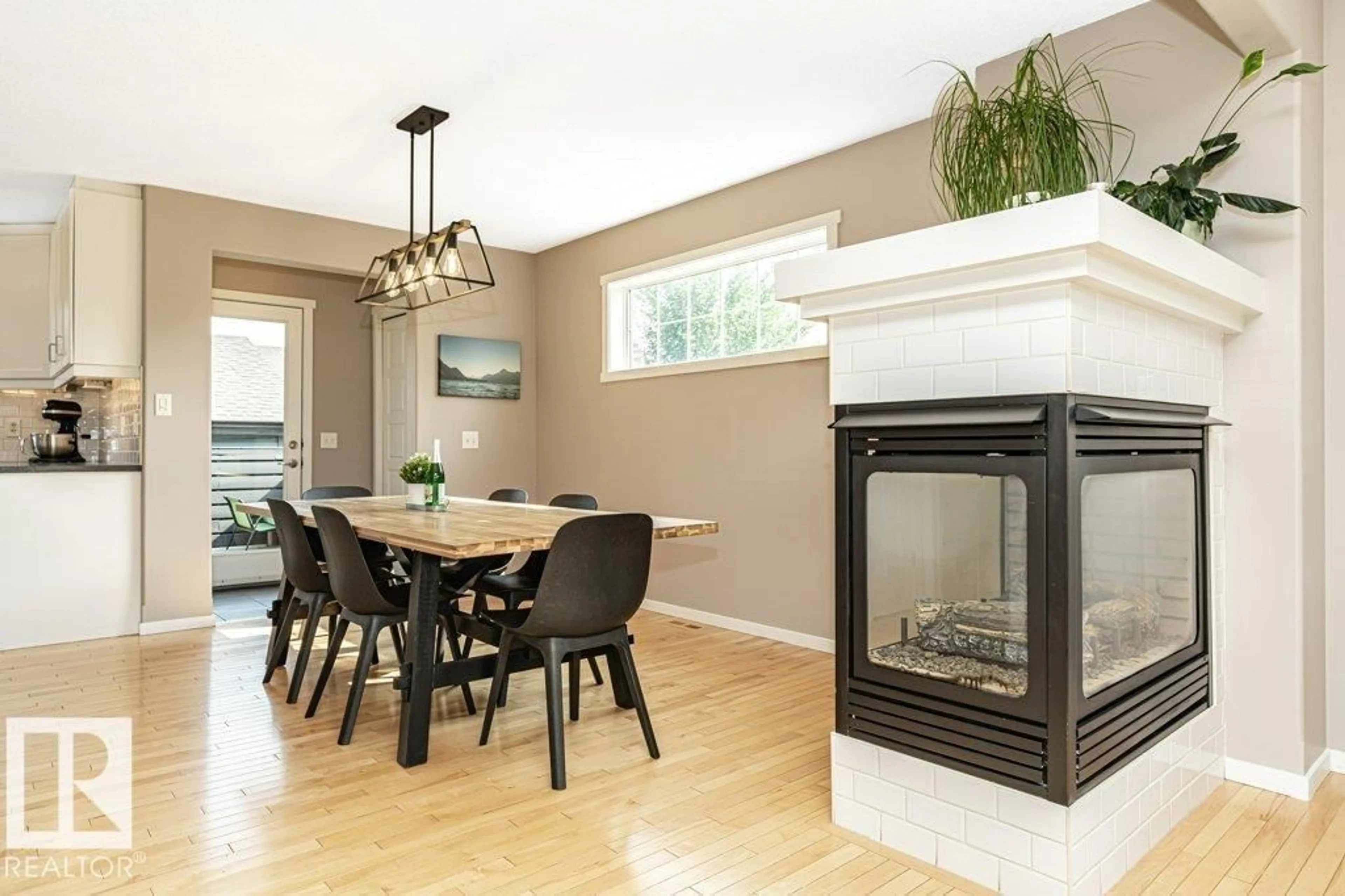 Dining room, wood/laminate floor for NW - 3551 13 ST, Edmonton Alberta T6T0J4