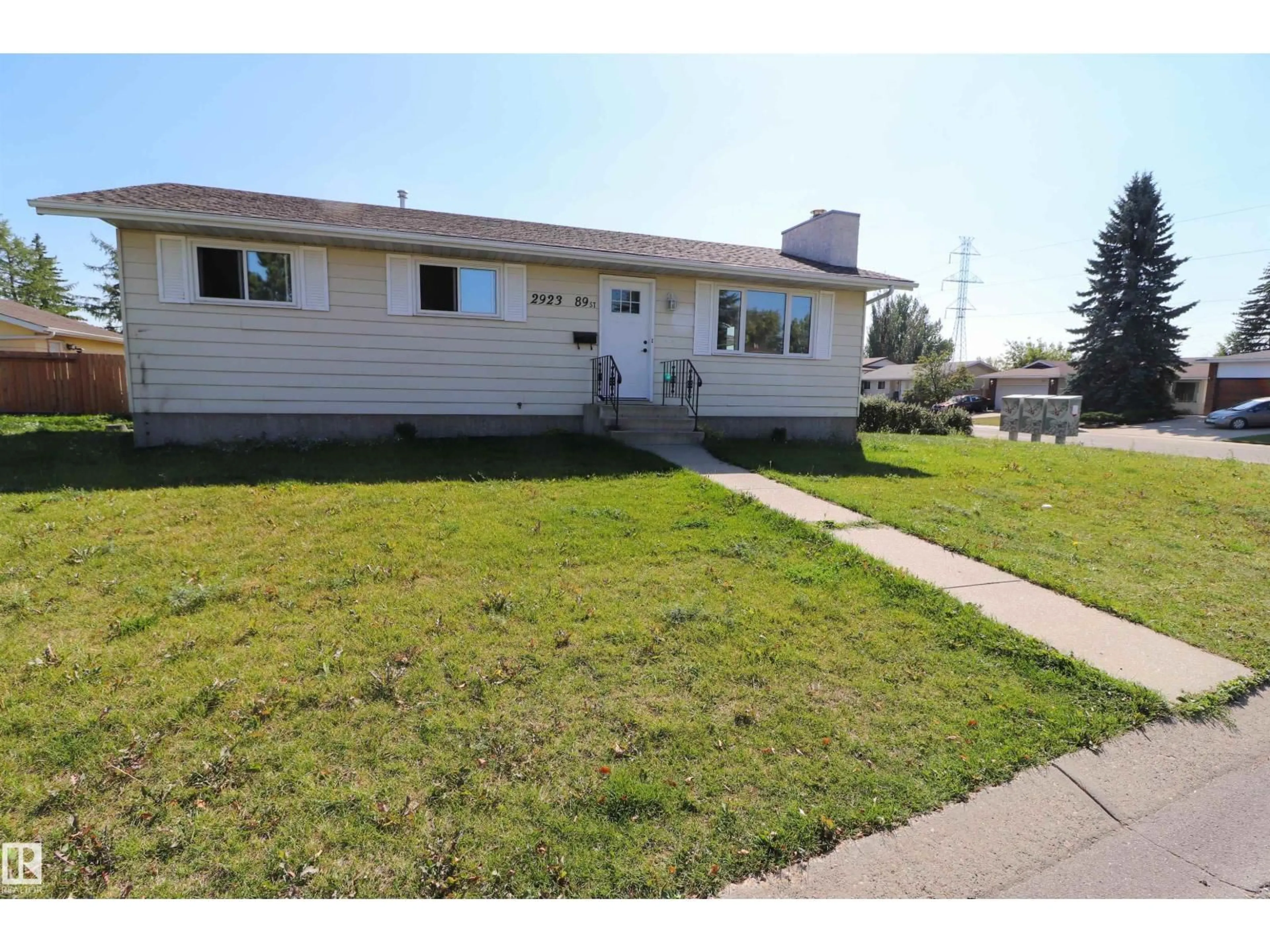 Home with vinyl exterior material, street for 2923 89 ST, Edmonton Alberta T6K3A7