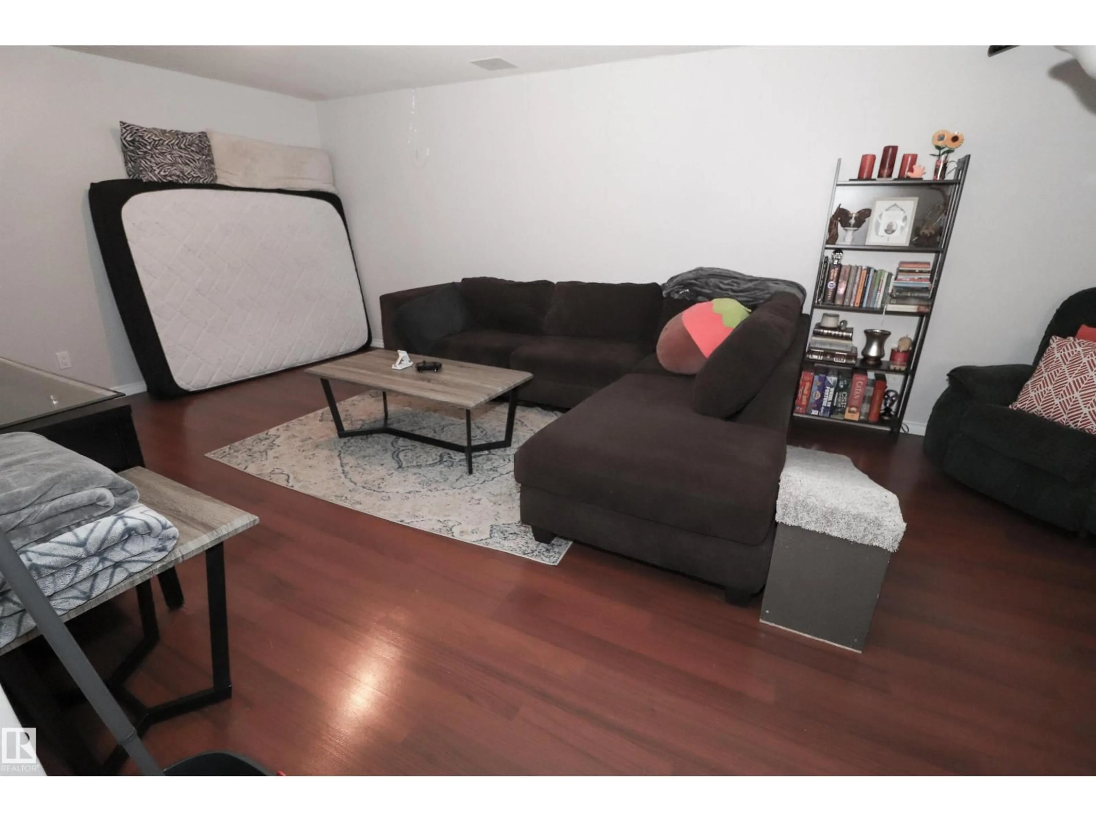 Living room with furniture, wood/laminate floor for 2923 89 ST, Edmonton Alberta T6K3A7