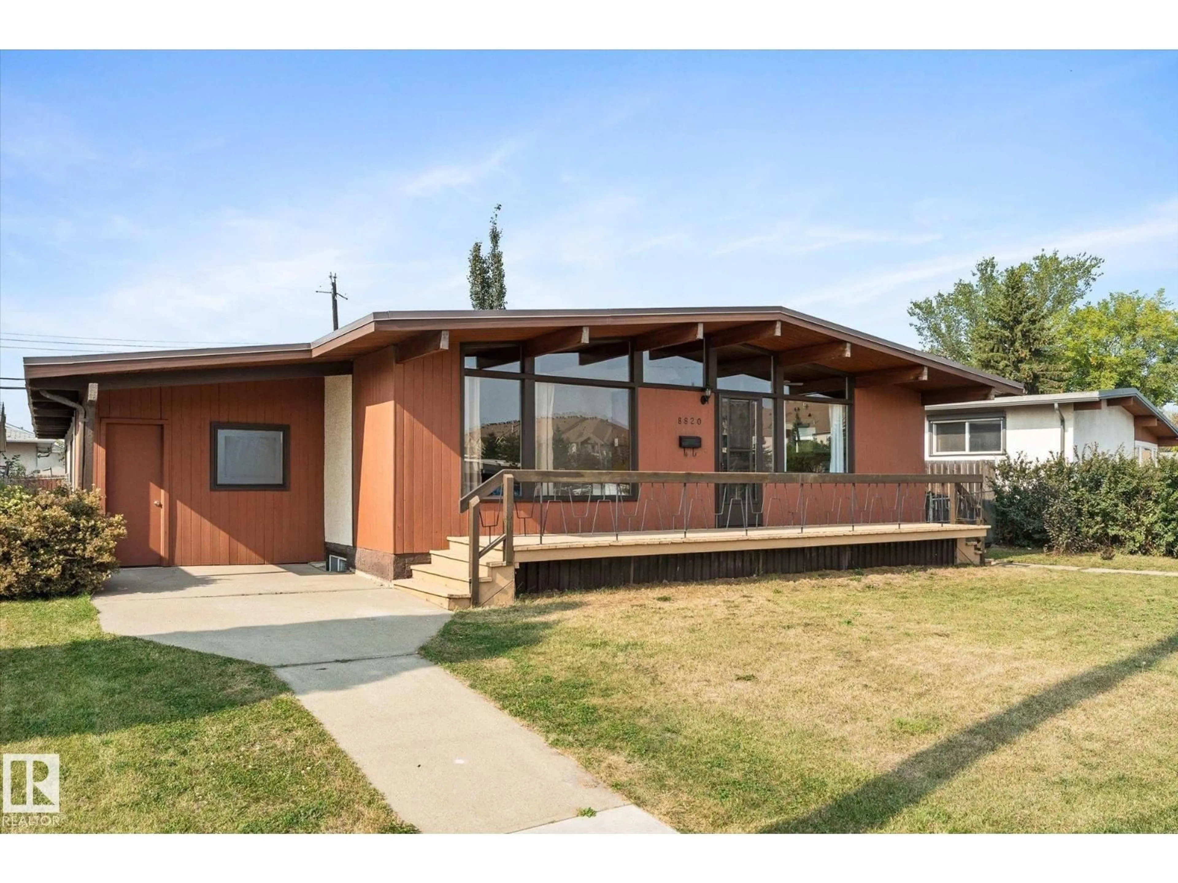 Home with brick exterior material, street for 8820 MEADOWLARK RD, Edmonton Alberta T5R5W7
