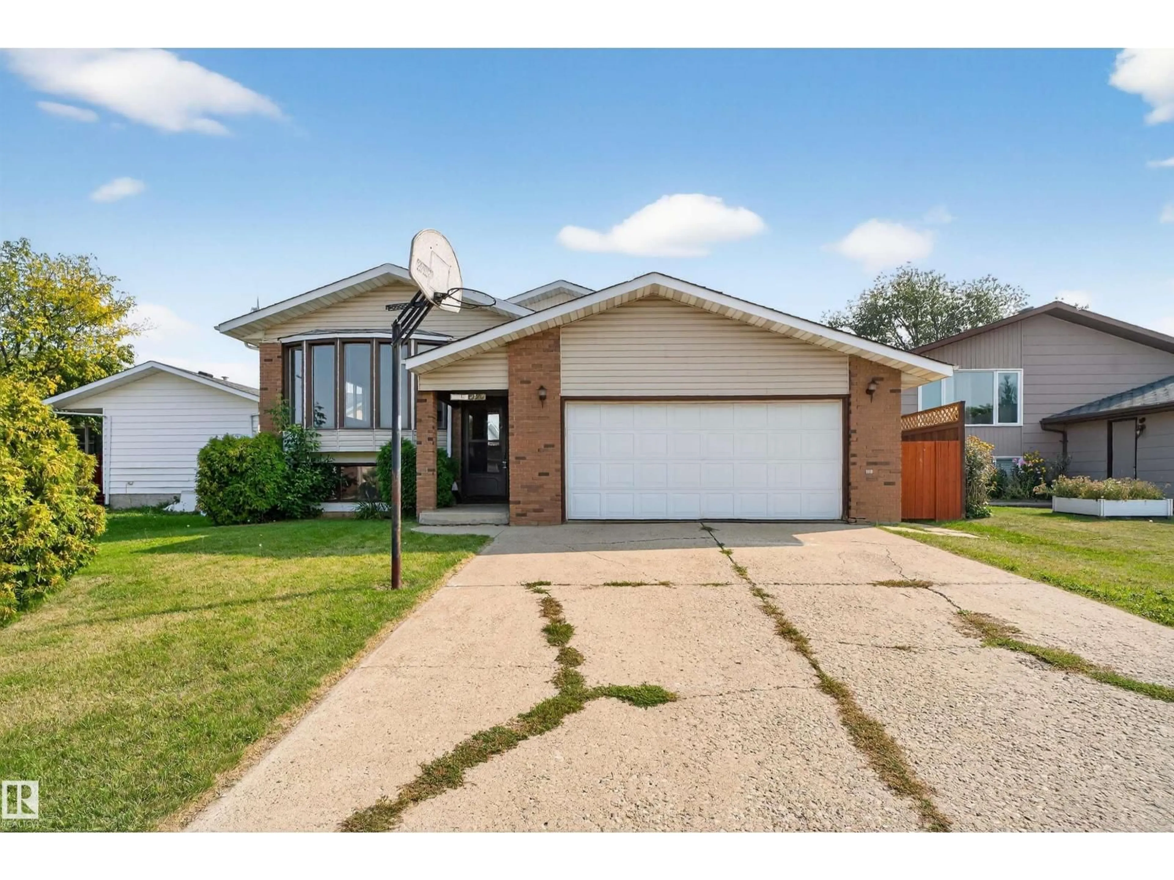Home with brick exterior material, street for NW - 1727 49A ST, Edmonton Alberta T6L2Y6