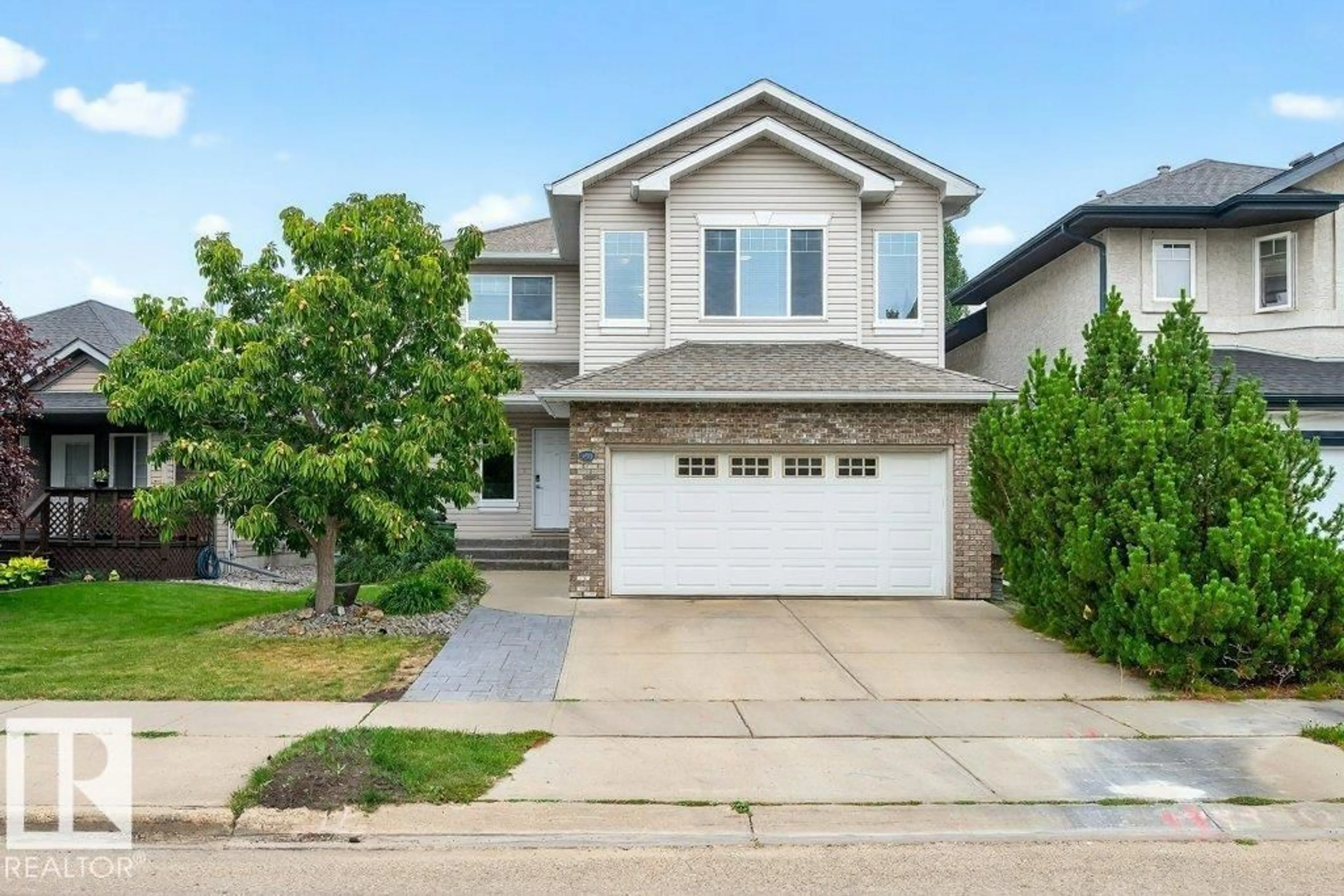 Home with vinyl exterior material, street for 950 BLACKMUD CREEK CR, Edmonton Alberta T6W1J3