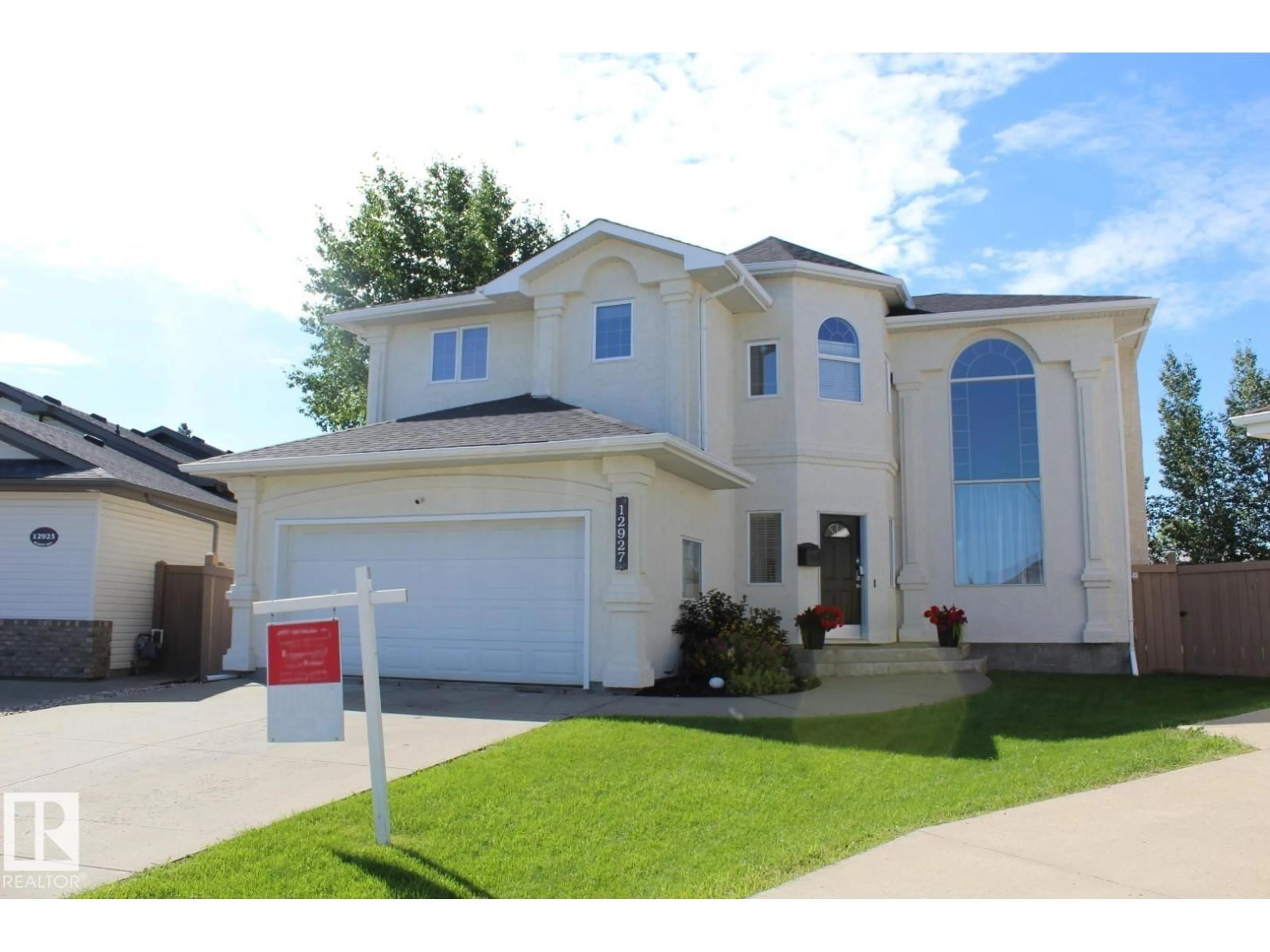 Home with vinyl exterior material, street for 12927 HUDSON WY, Edmonton Alberta T6V1M4