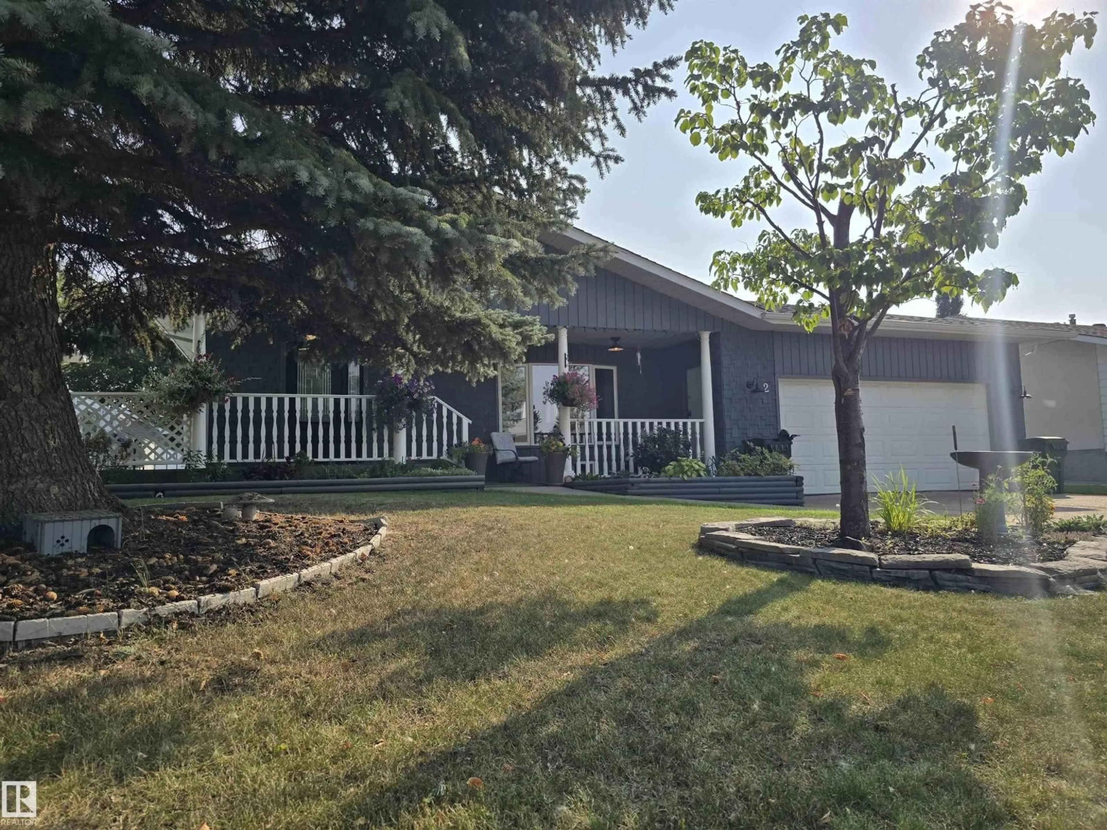 A pic from outside/outdoor area/front of a property/back of a property/a pic from drone, street for 2 ANDERSON, Leduc Alberta T9E5H3