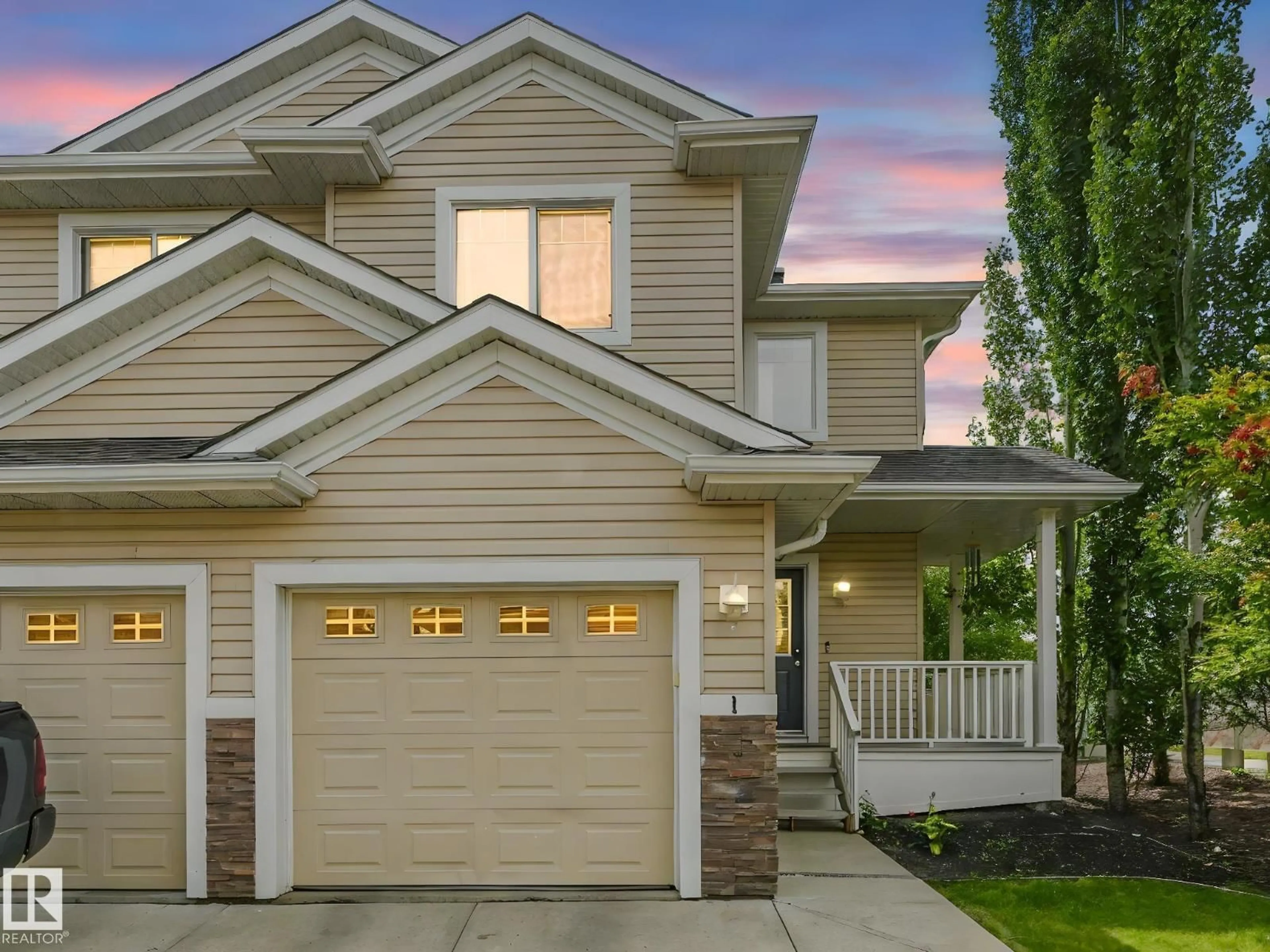 Home with vinyl exterior material, street for 655 TAMARACK RD, Edmonton Alberta T6T0N4