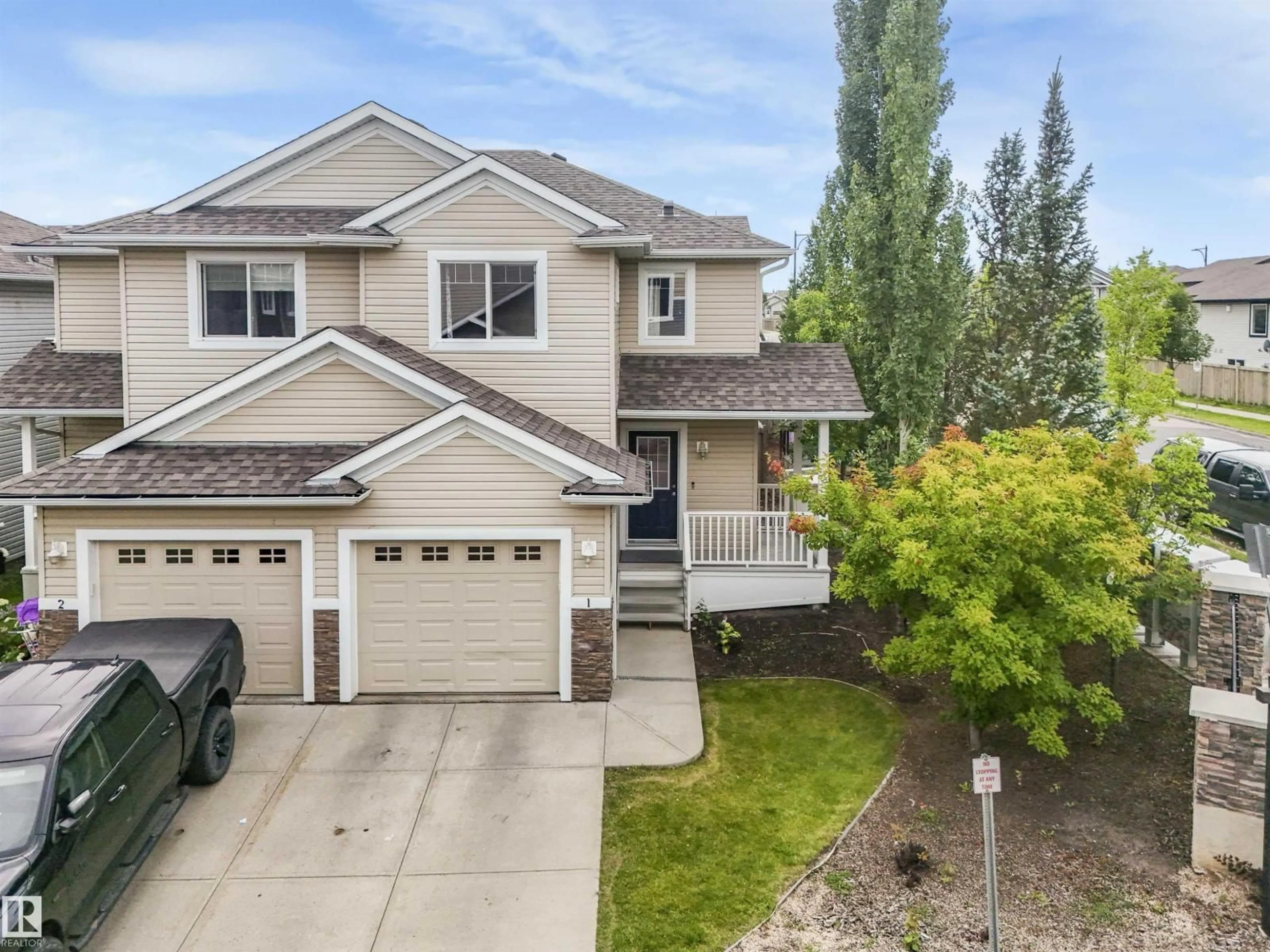 A pic from outside/outdoor area/front of a property/back of a property/a pic from drone, street for 655 TAMARACK RD, Edmonton Alberta T6T0N4