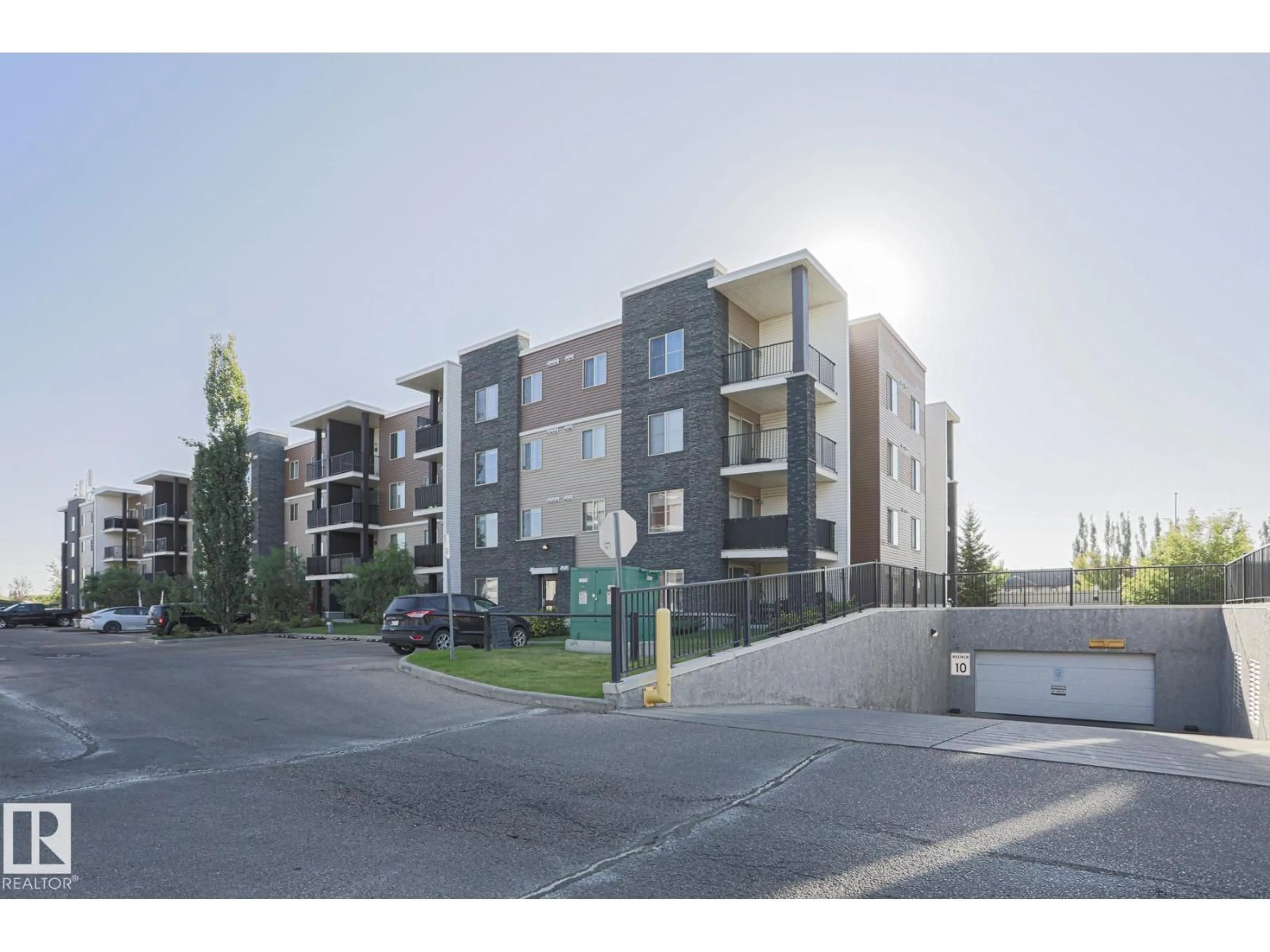 A pic from outside/outdoor area/front of a property/back of a property/a pic from drone, street for 314 11808 22 AV SW, Edmonton Alberta T6W2A2