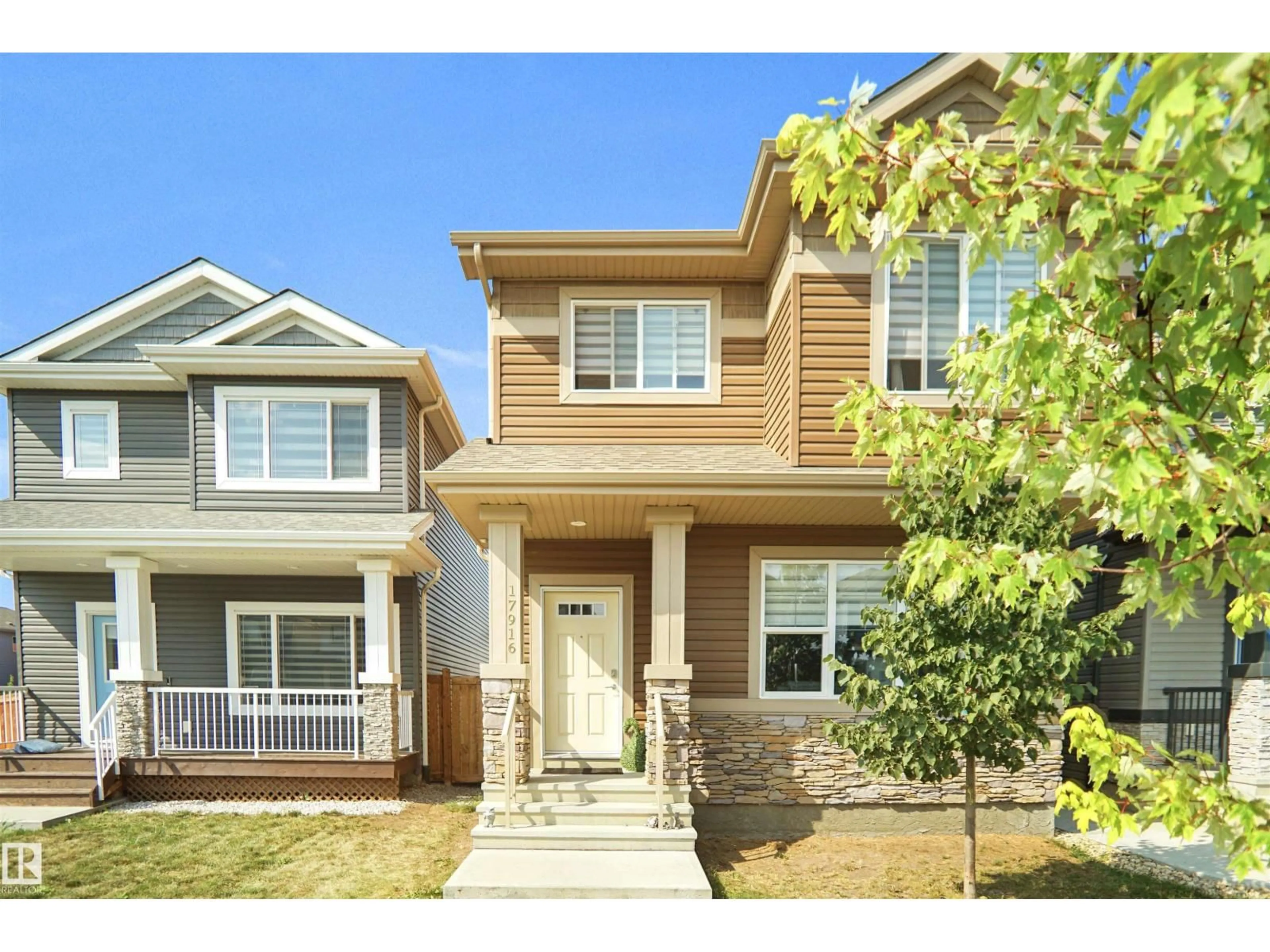 Home with vinyl exterior material, street for 17916 62 ST, Edmonton Alberta T5Y3Z4