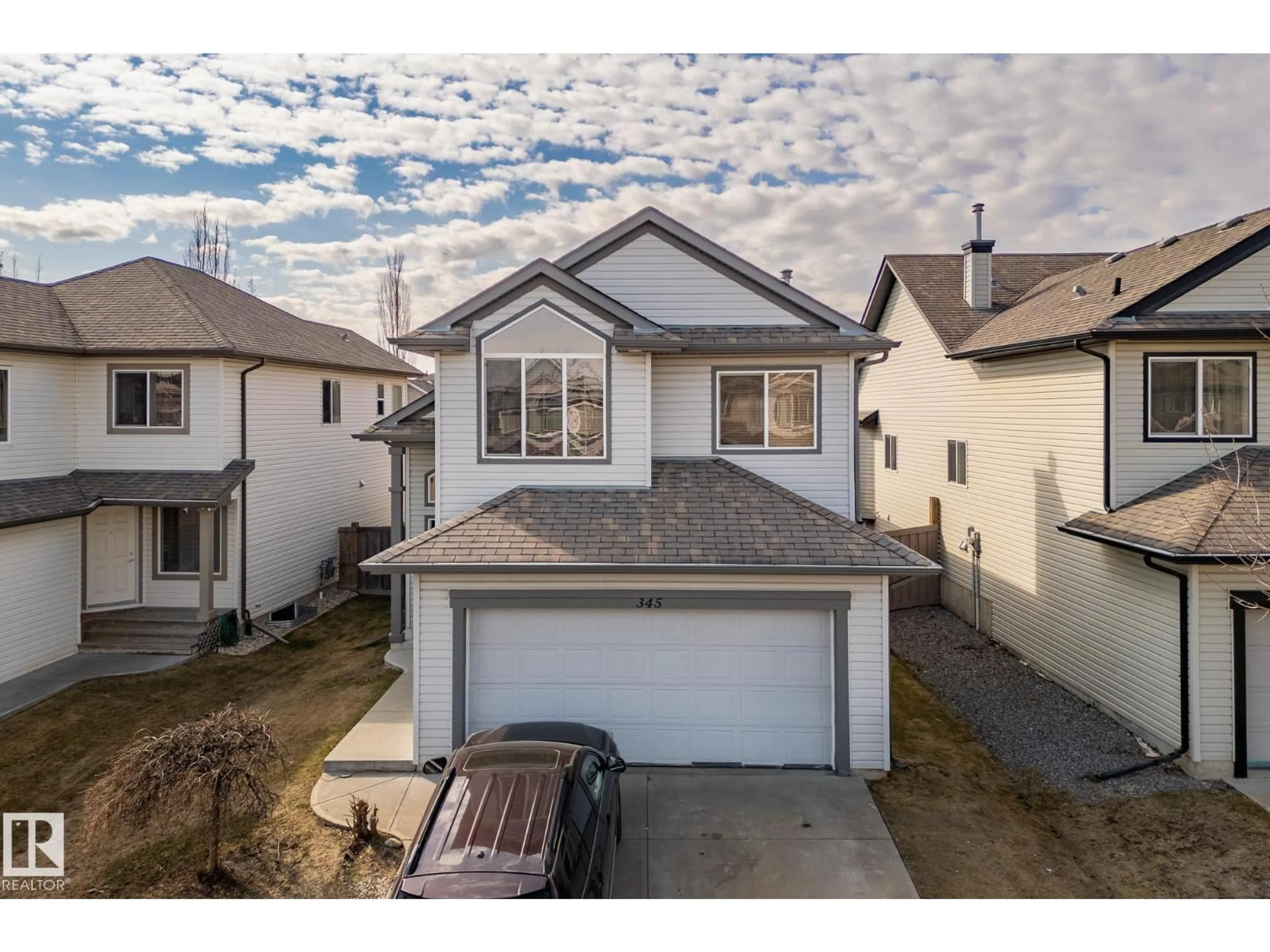 A pic from outside/outdoor area/front of a property/back of a property/a pic from drone, street for 345 MACEWAN RD, Edmonton Alberta T6W1V8