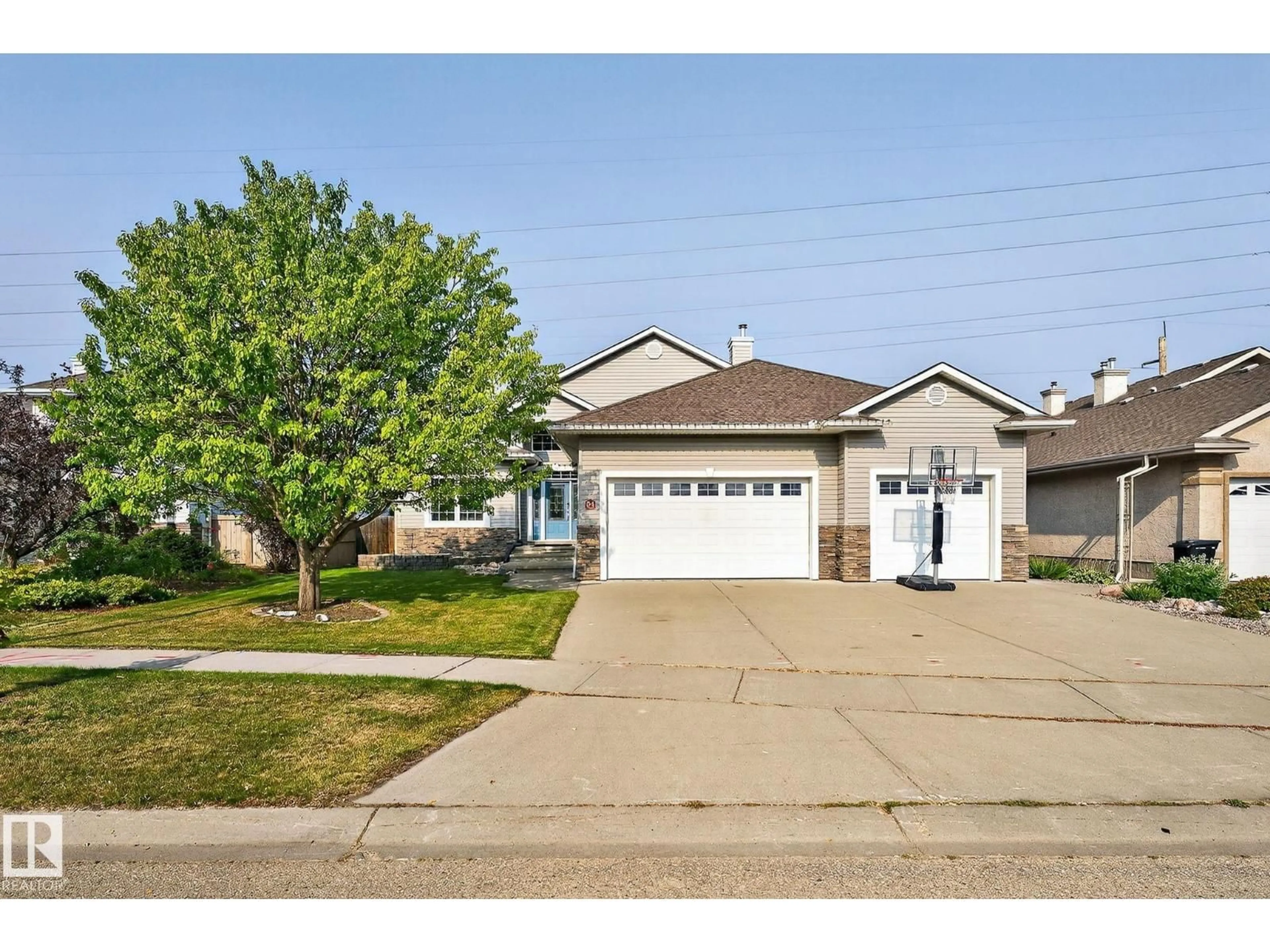 Home with vinyl exterior material, street for 34 VALLEYVIEW RG, Fort Saskatchewan Alberta T8L4P2