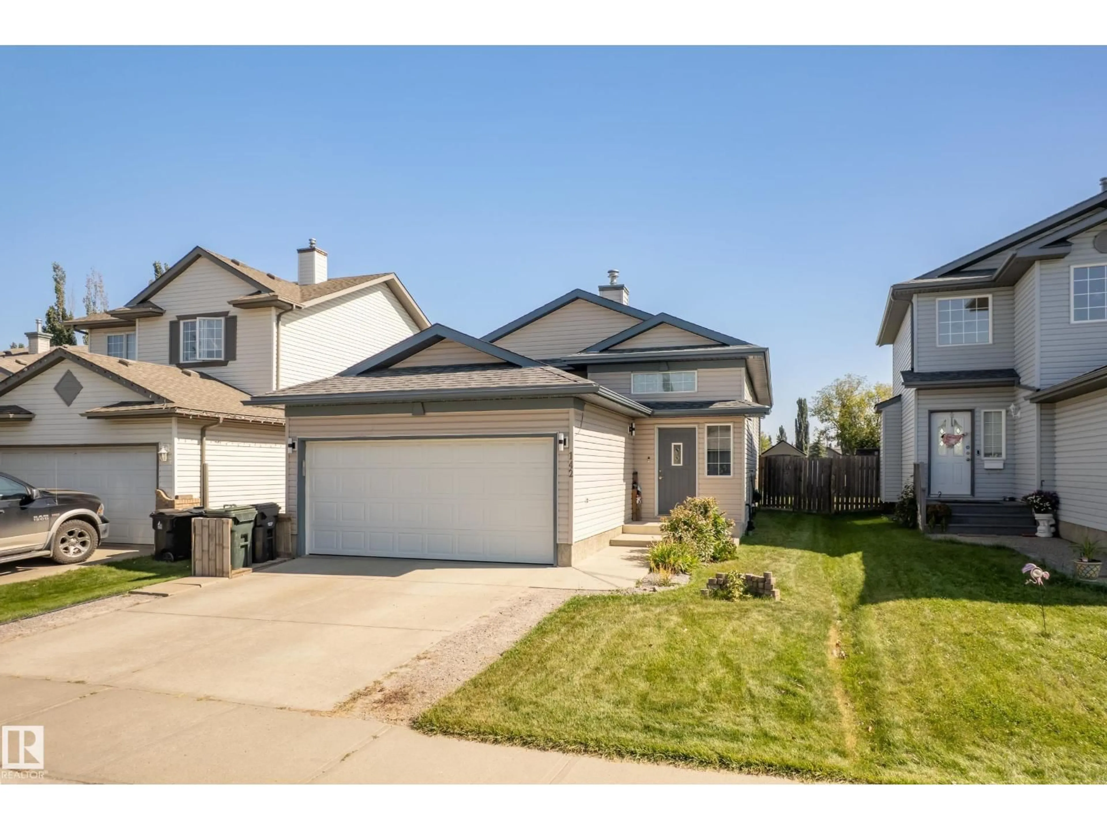 A pic from outside/outdoor area/front of a property/back of a property/a pic from drone, street for 142 LAKELAND DRIVE, Spruce Grove Alberta T7X4A5