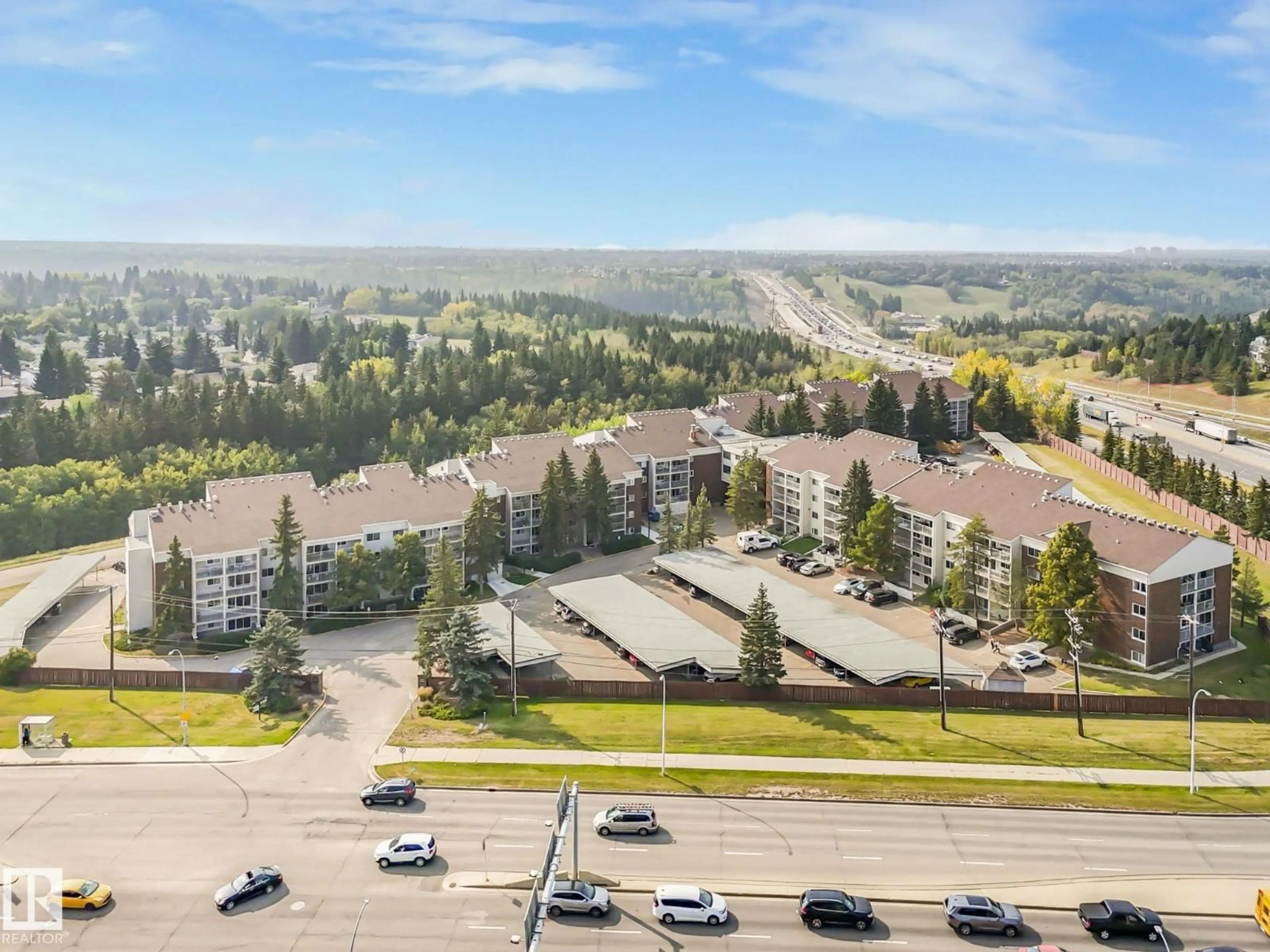A pic from outside/outdoor area/front of a property/back of a property/a pic from drone, mountain view for 125 - 4404 122 ST, Edmonton Alberta T6J4A9