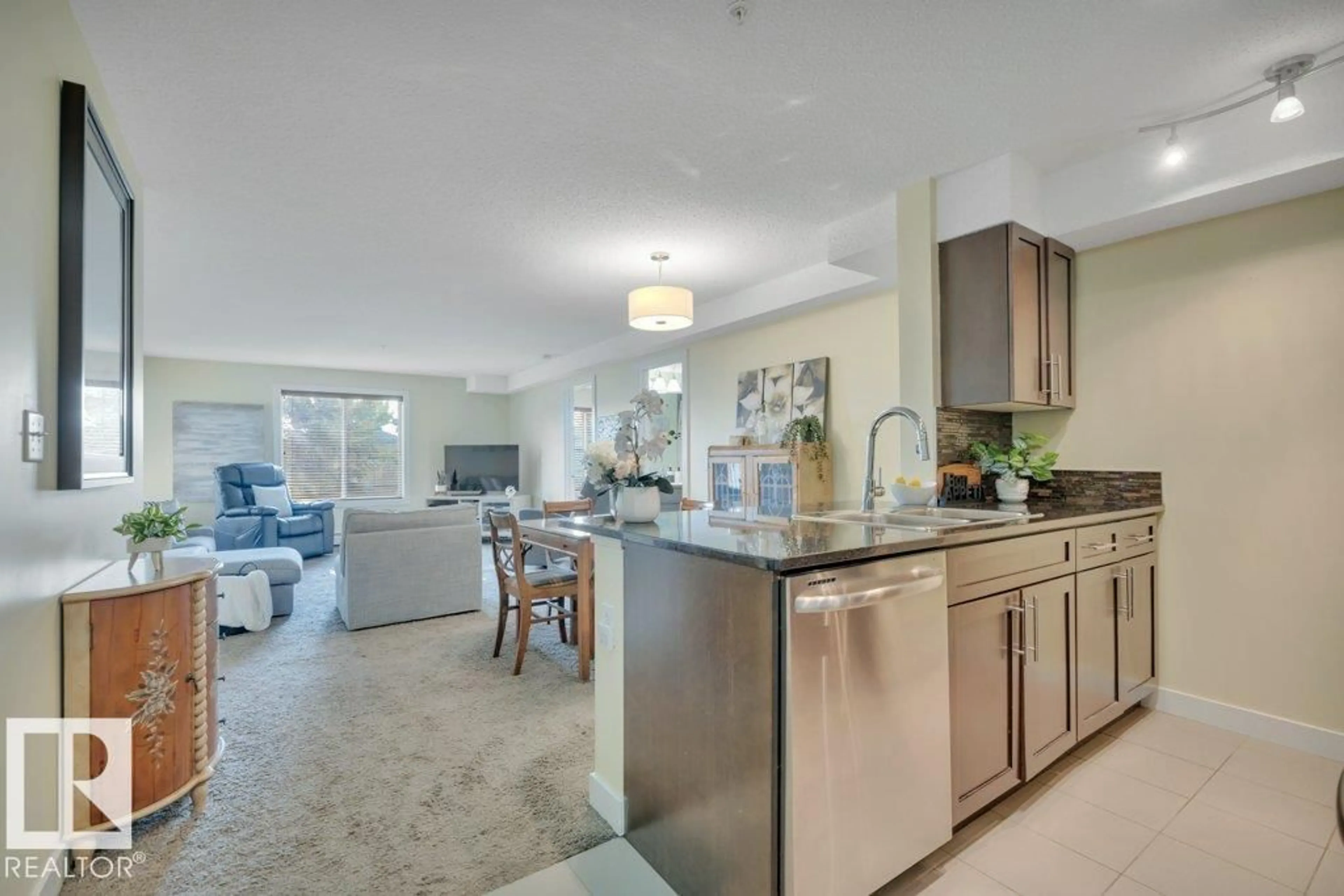 Open concept kitchen, ceramic/tile floor for 110 - 11808 22 AV, Edmonton Alberta T6W2A2