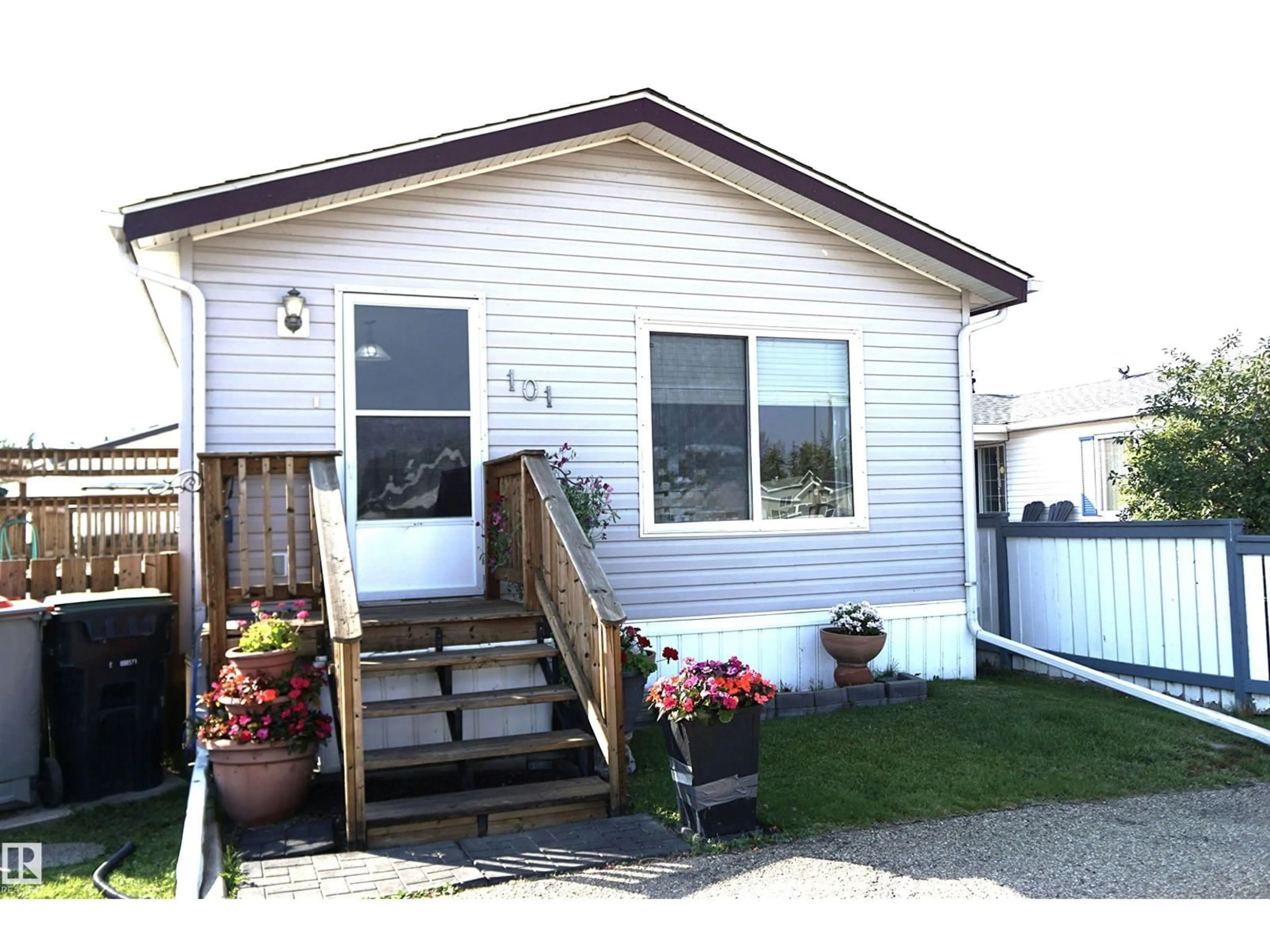 Home with vinyl exterior material, street for #101 - 4819 51 AV, Millet Alberta T0C1Z0