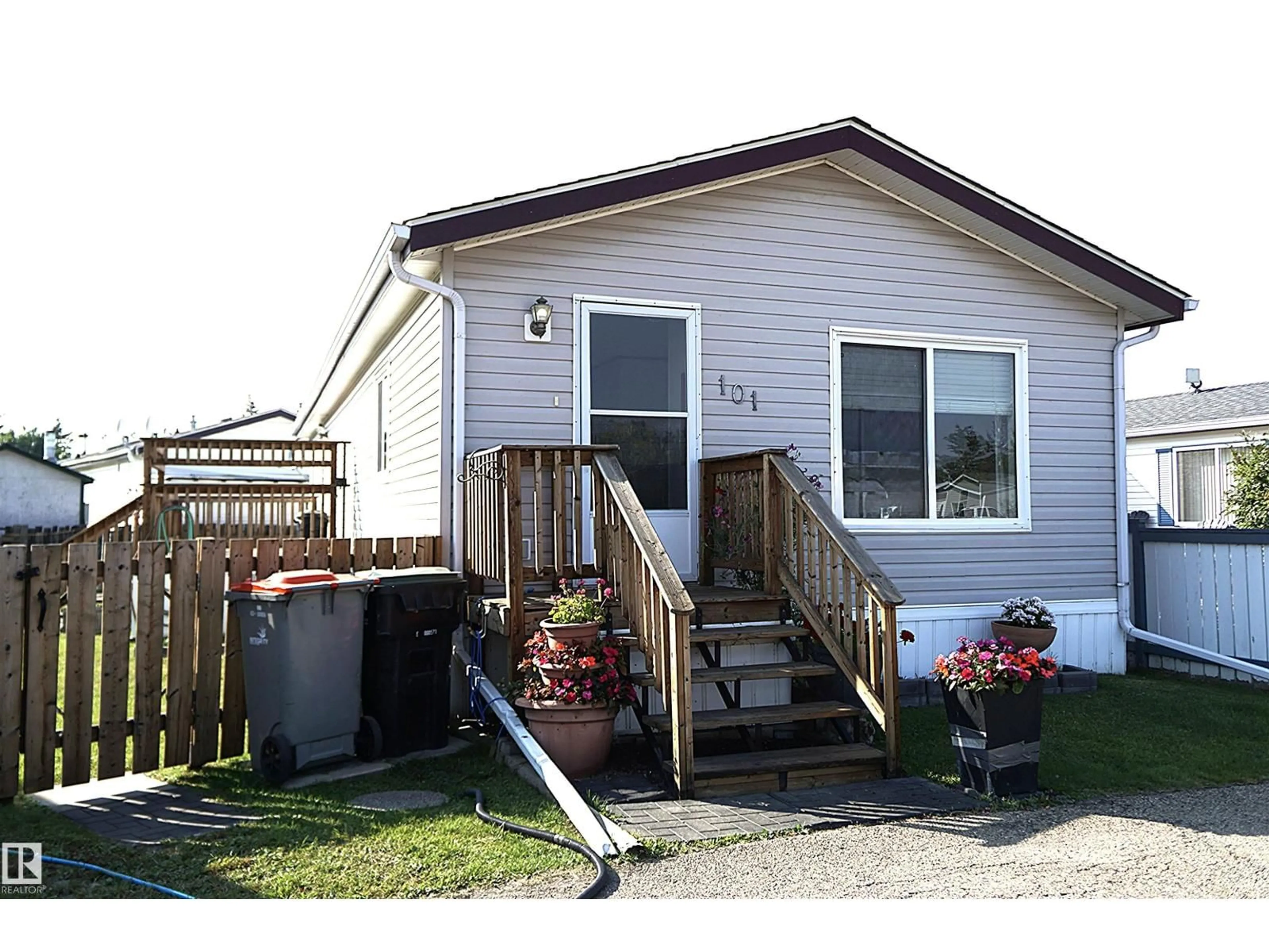 Home with vinyl exterior material, street for #101 - 4819 51 AV, Millet Alberta T0C1Z0