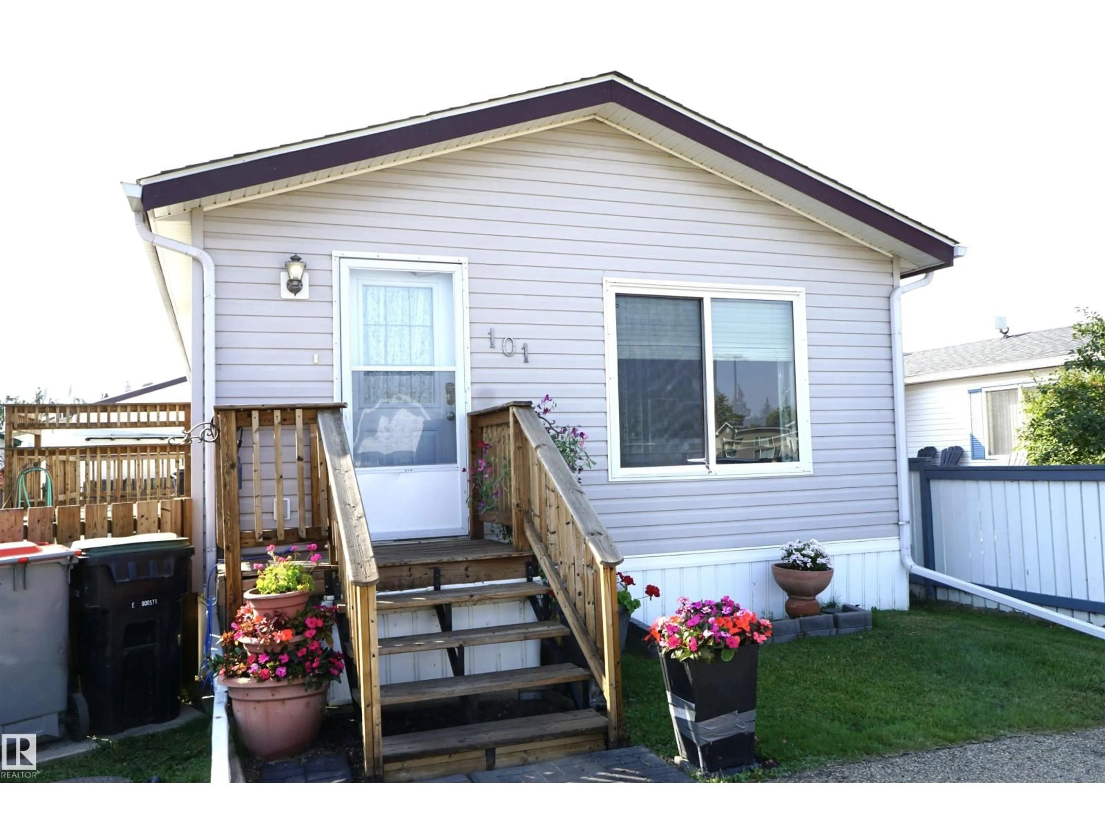 Home with vinyl exterior material, street for #101 - 4819 51 AV, Millet Alberta T0C1Z0