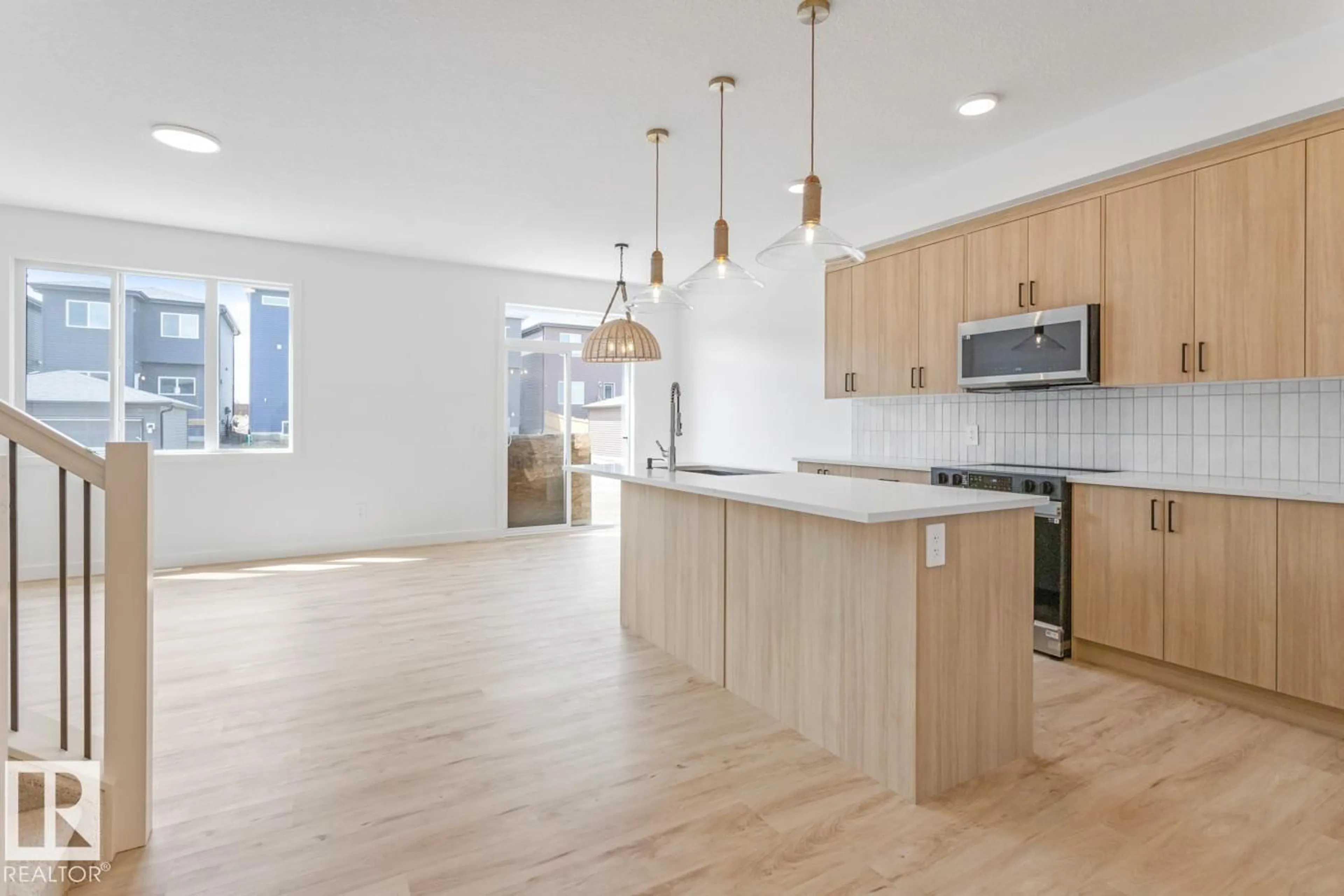 Open concept kitchen, wood/laminate floor for 597 CORRAL CI, Sherwood Park Alberta T0B0B0