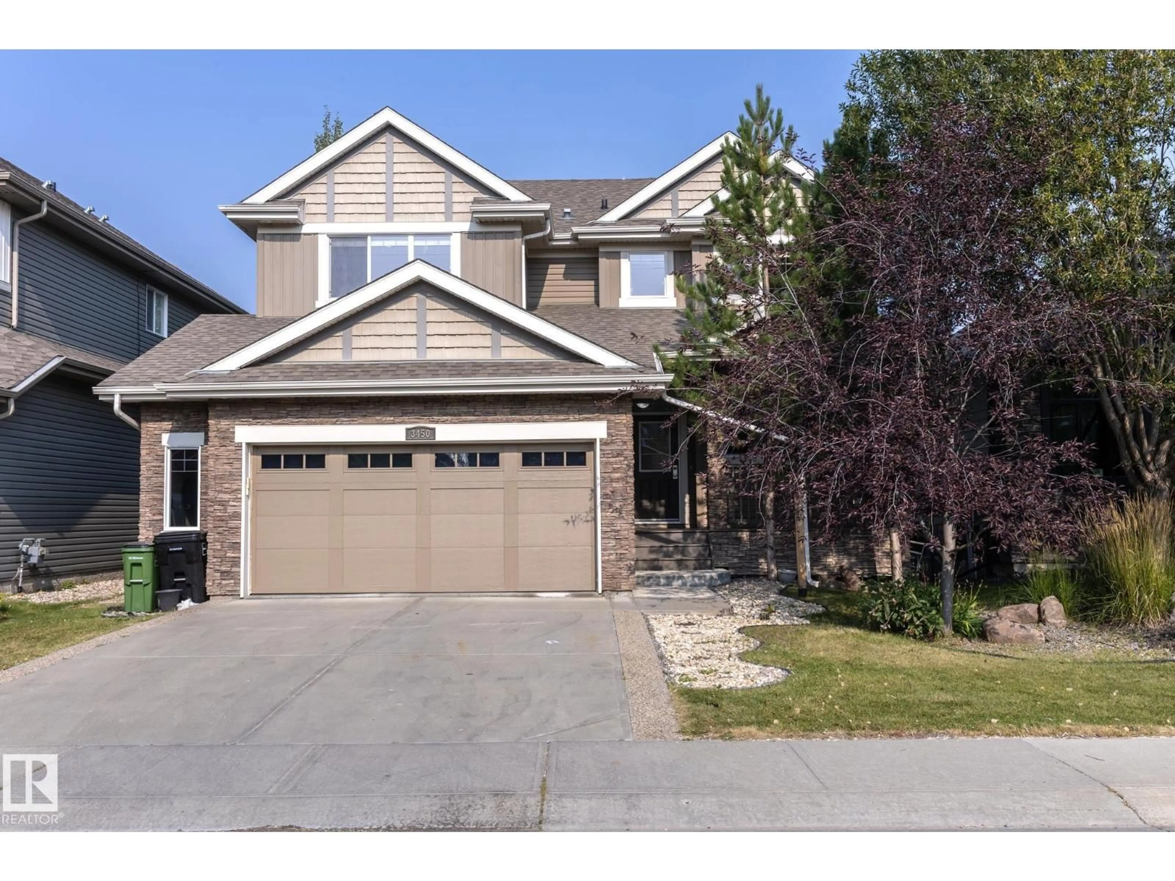 Home with vinyl exterior material, street for 3450 LD NW, Edmonton Alberta T6W0T4